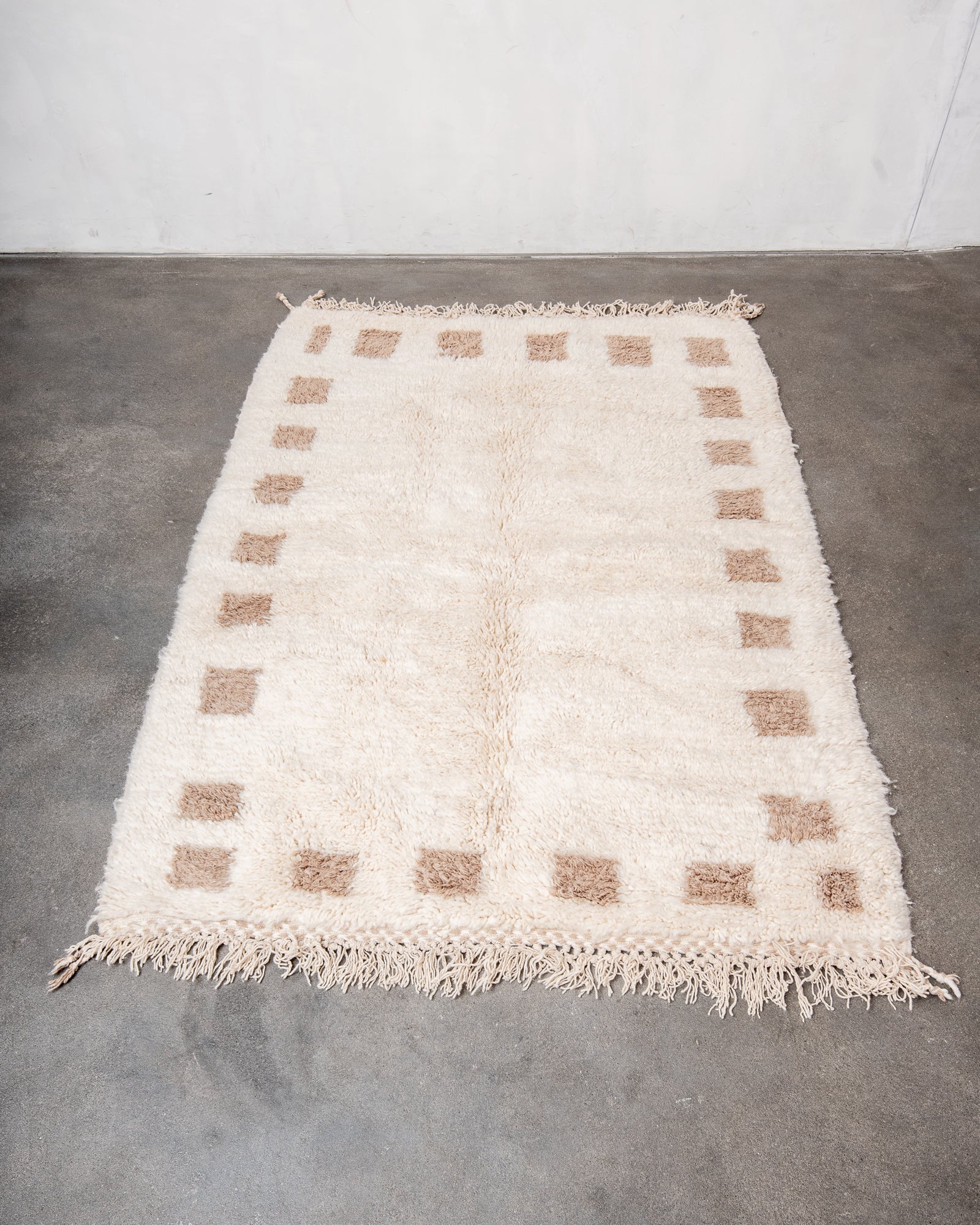 Modern, designer, handcrafted Berber rug from Morocco. Beniourain carpet with beautiful colours and patterns and fluffy wool texture.