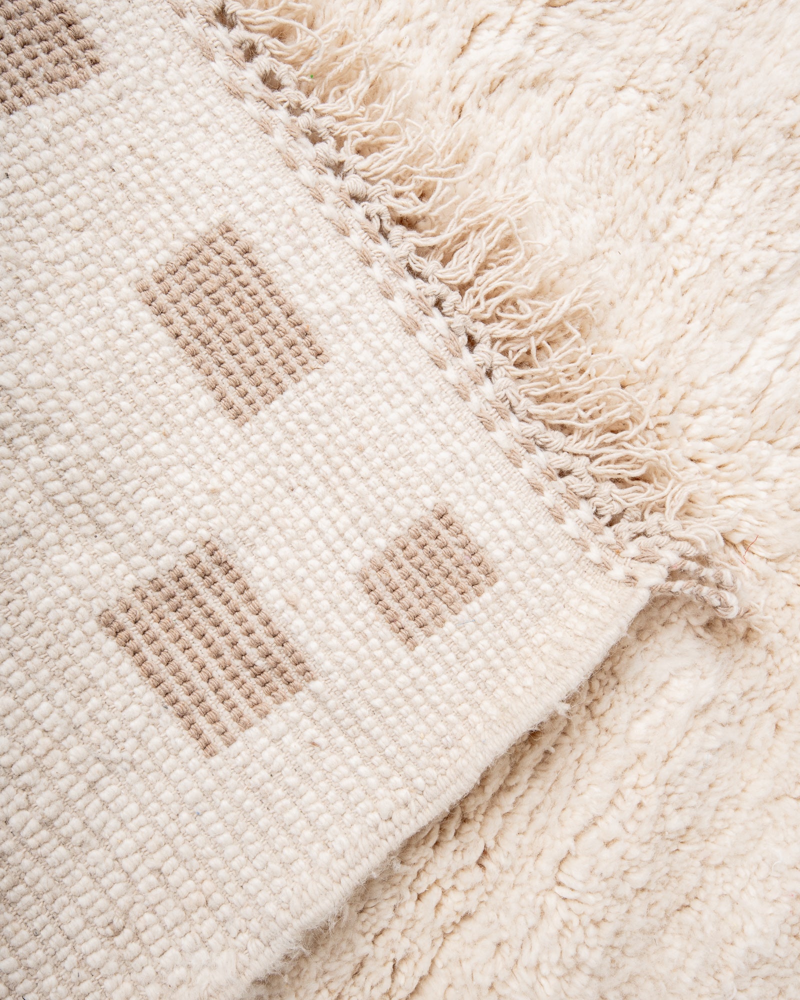 Modern, designer, handcrafted Berber rug from Morocco. Beniourain carpet with beautiful colours and patterns and fluffy wool texture.