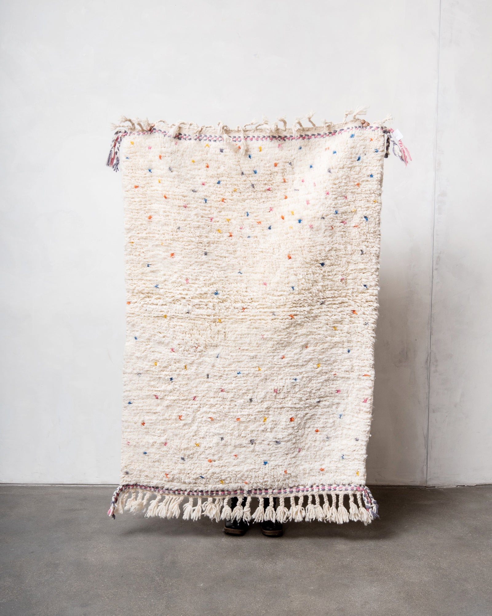 Modern, designer, handcrafted Berber rug from Morocco. Beniourain carpet with beautiful colours and patterns and fluffy wool texture.