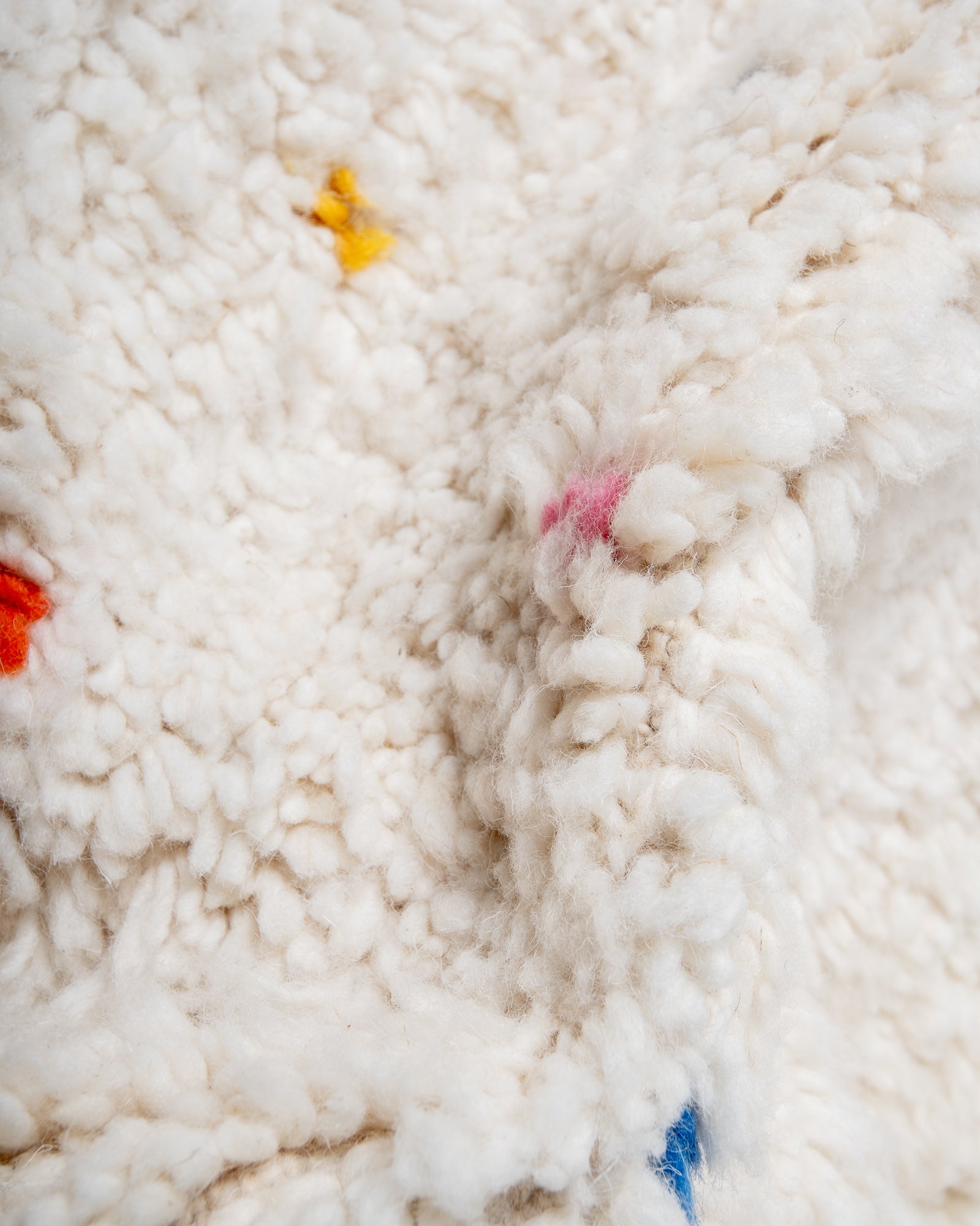 Modern, designer, handcrafted Berber rug from Morocco. Beniourain carpet with beautiful colours and patterns and fluffy wool texture.