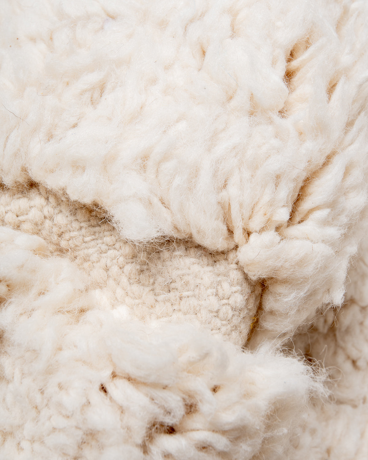 Modern, designer, handcrafted Berber rug from Morocco. Beniourain carpet with beautiful colours and patterns and fluffy wool texture.