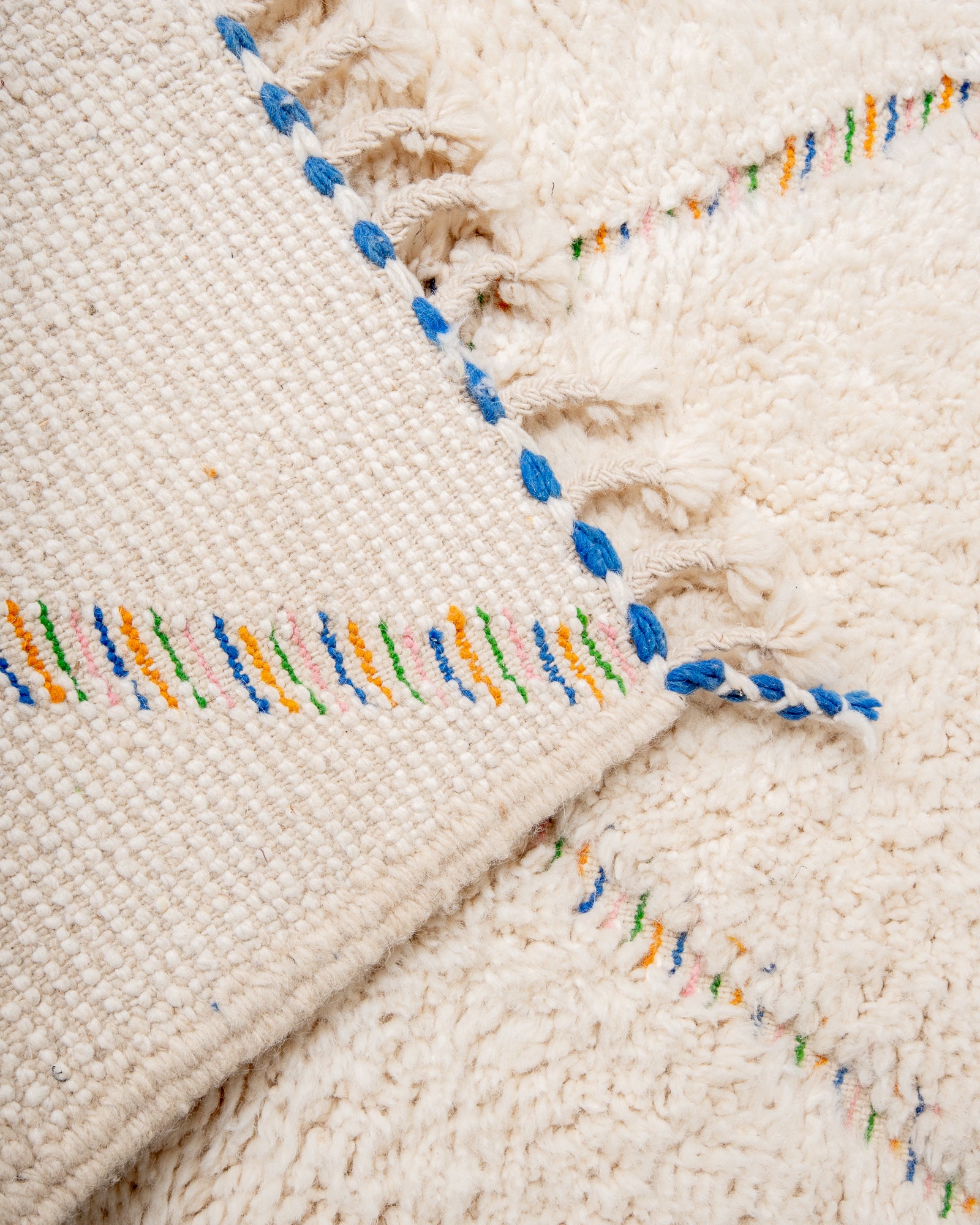 Modern, designer, handcrafted Berber rug from Morocco. Beniourain carpet with beautiful colours and patterns and fluffy wool texture. 