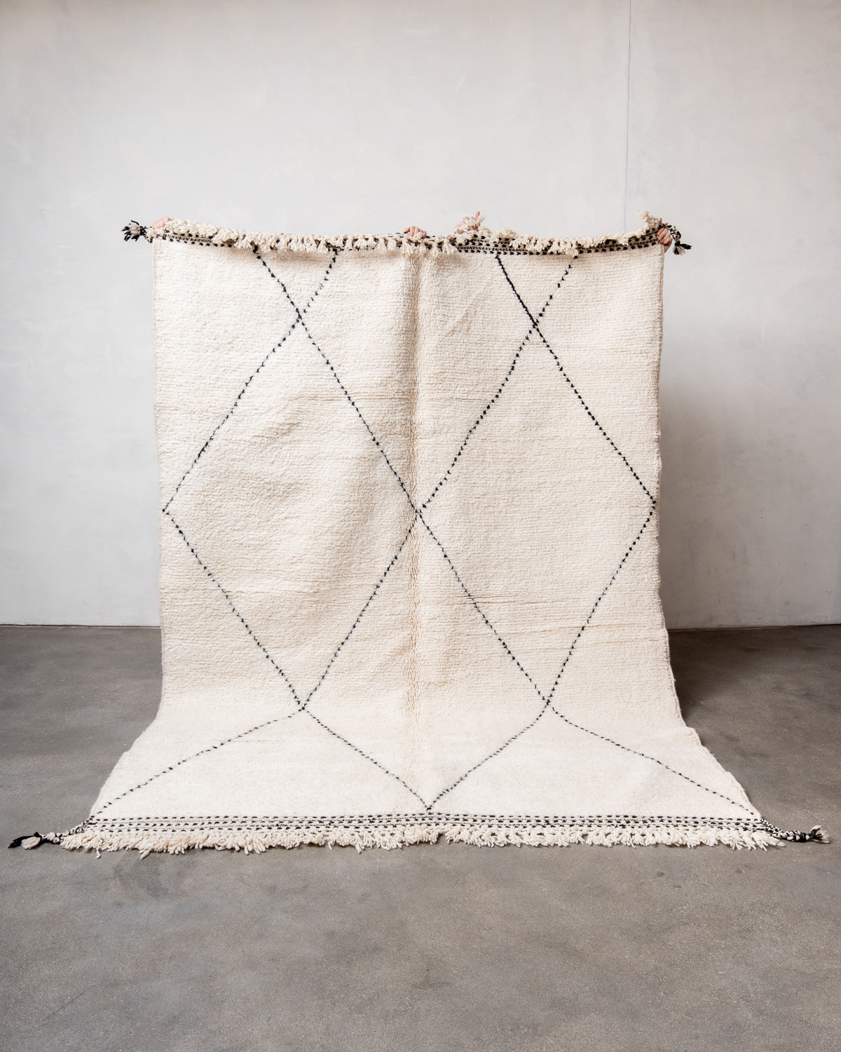 Modern, designer, handcrafted Berber rug from Morocco. Beniourain carpet with minimalist design, natural wool pile and a fluffy texture.