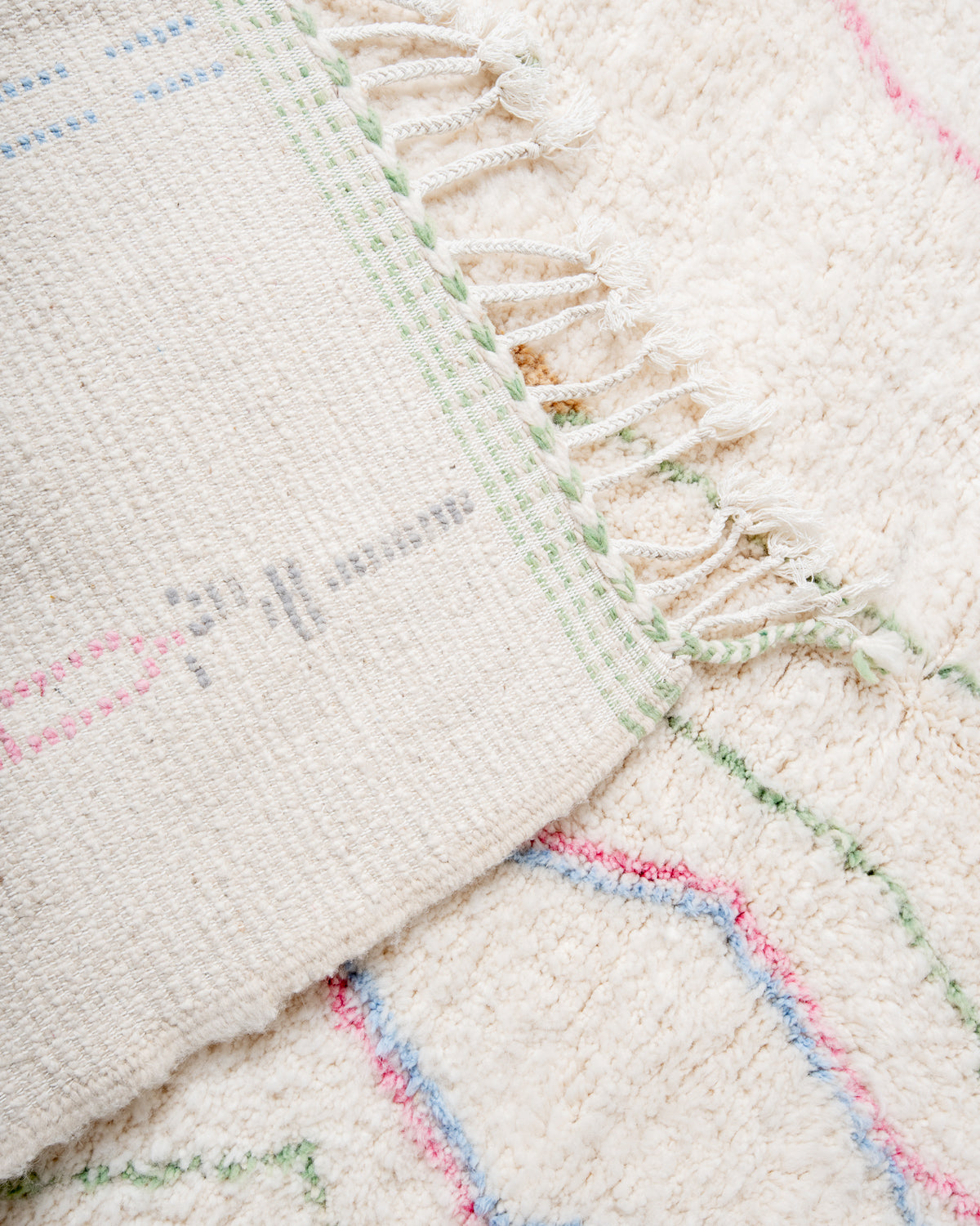 Modern, designer, handcrafted Berber rug from Morocco. Beniourain carpet with minimalist design, natural wool pile and a fluffy texture.