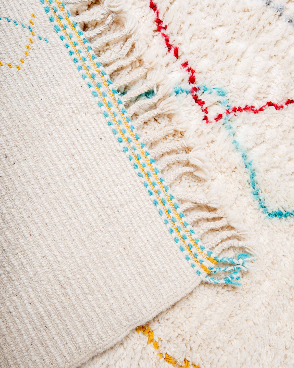 Modern, designer, handcrafted Berber rug from Morocco. Beniourain carpet with minimalist design, natural wool pile and a fluffy texture.