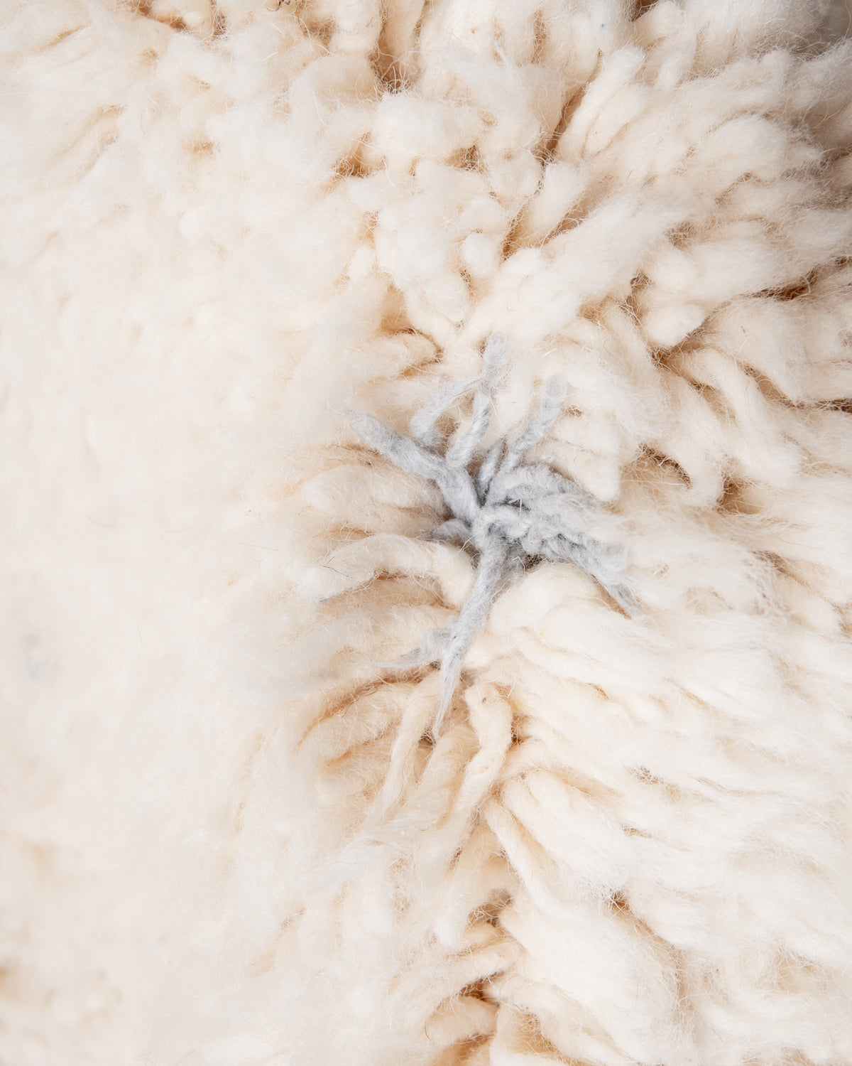 Modern, designer, handcrafted Berber rug from Morocco. Beniourain carpet with minimalist design, natural wool pile and a fluffy texture.