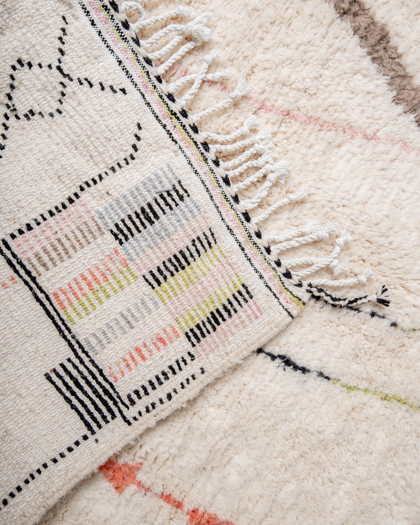 Modern, designer, handcrafted Berber rug from Morocco. Beniourain carpet with minimalist design, natural wool pile and a fluffy texture.