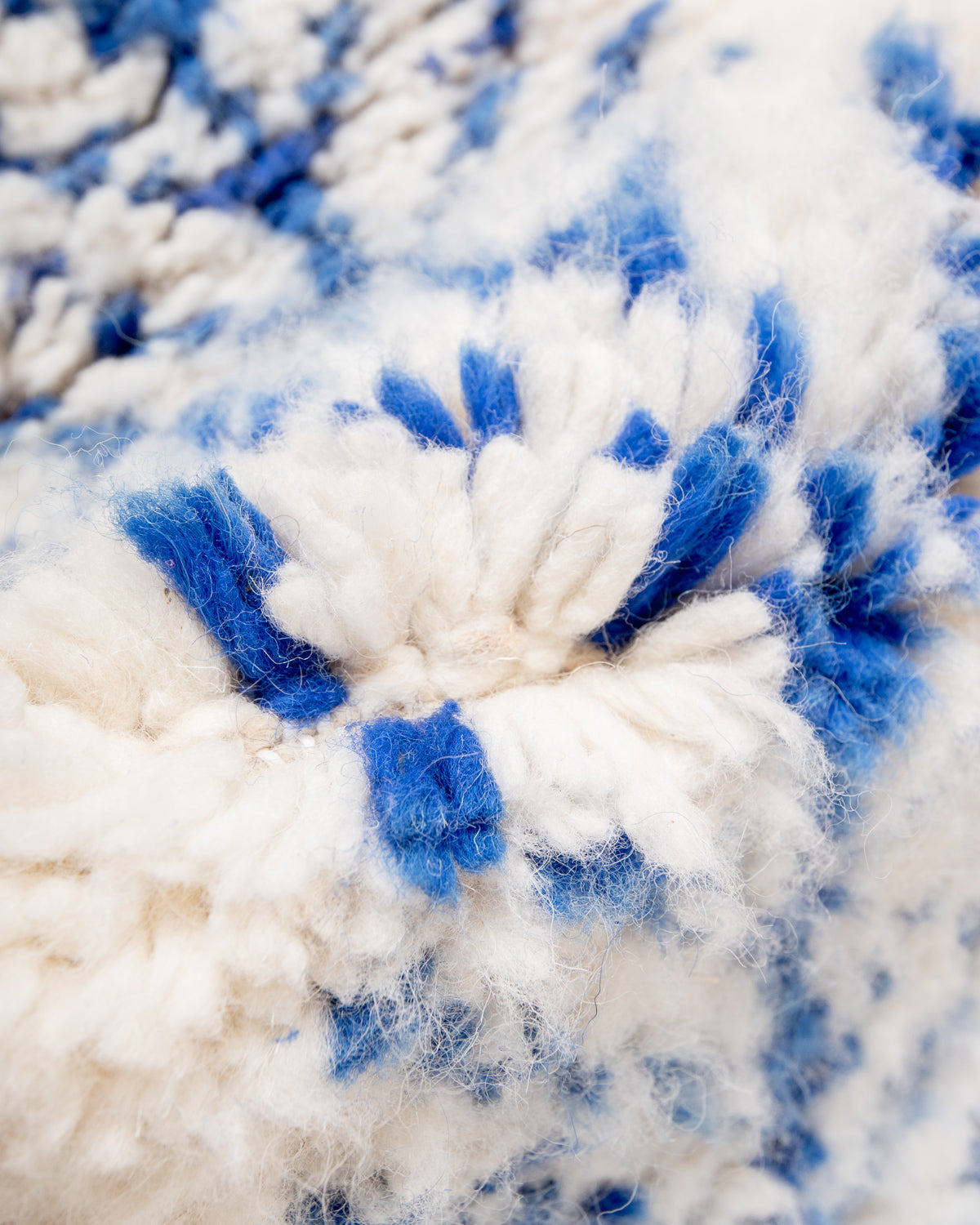 Modern, designer, handcrafted Berber rug from Morocco. Beniourain carpet with minimalist design, natural wool pile and a fluffy texture.