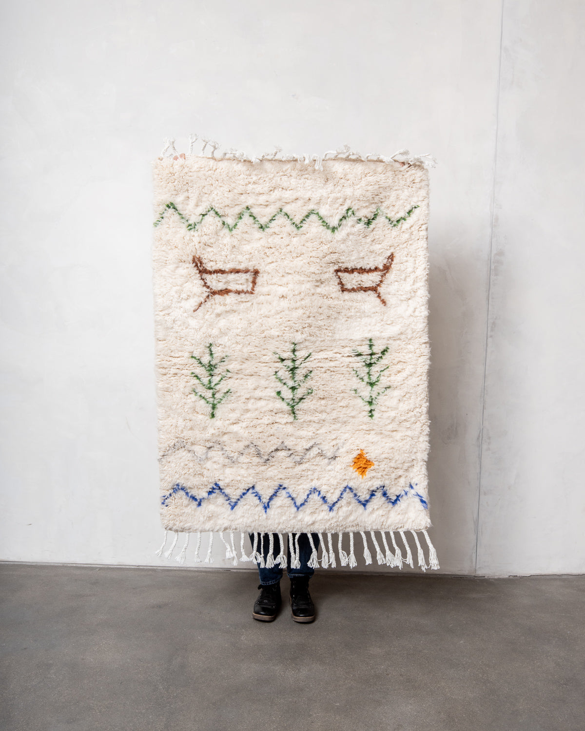 Modern, designer, handcrafted Berber rug from Morocco. Beniourain carpet with minimalist design, natural wool pile and a fluffy texture.