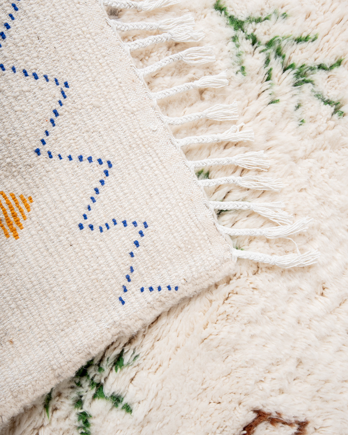 Modern, designer, handcrafted Berber rug from Morocco. Beniourain carpet with minimalist design, natural wool pile and a fluffy texture.