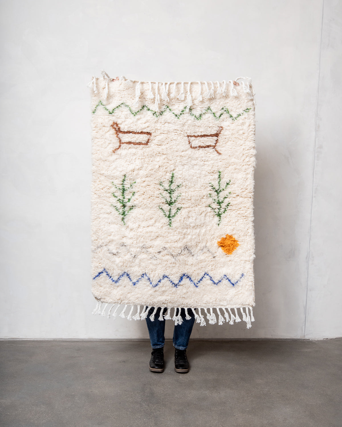 Modern, designer, handcrafted Berber rug from Morocco. Beniourain carpet with minimalist design, natural wool pile and a fluffy texture.