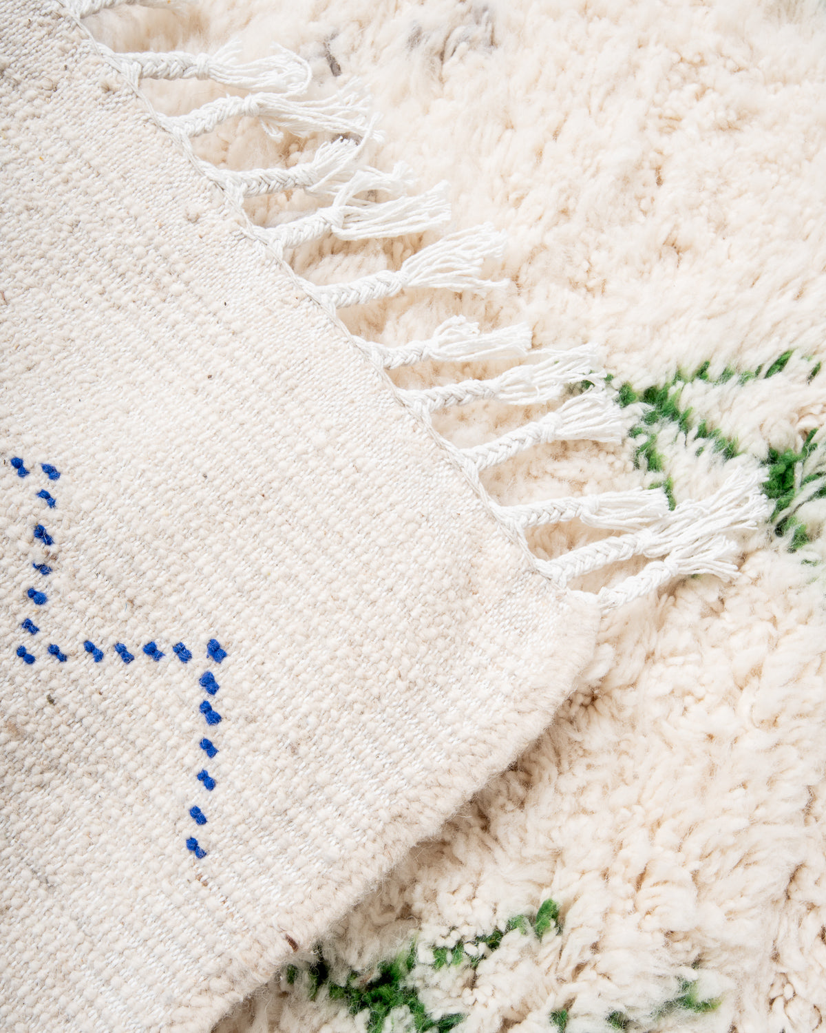 Modern, designer, handcrafted Berber rug from Morocco. Beniourain carpet with minimalist design, natural wool pile and a fluffy texture.