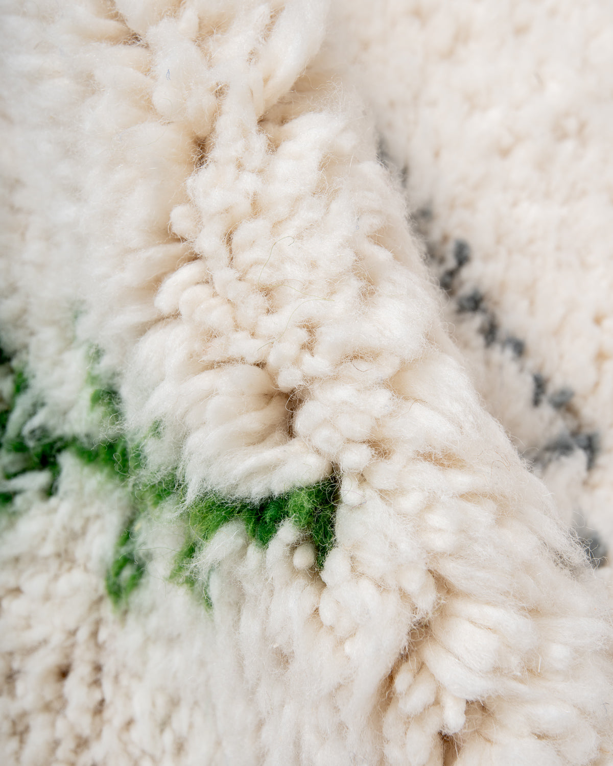 Modern, designer, handcrafted Berber rug from Morocco. Beniourain carpet with minimalist design, natural wool pile and a fluffy texture.