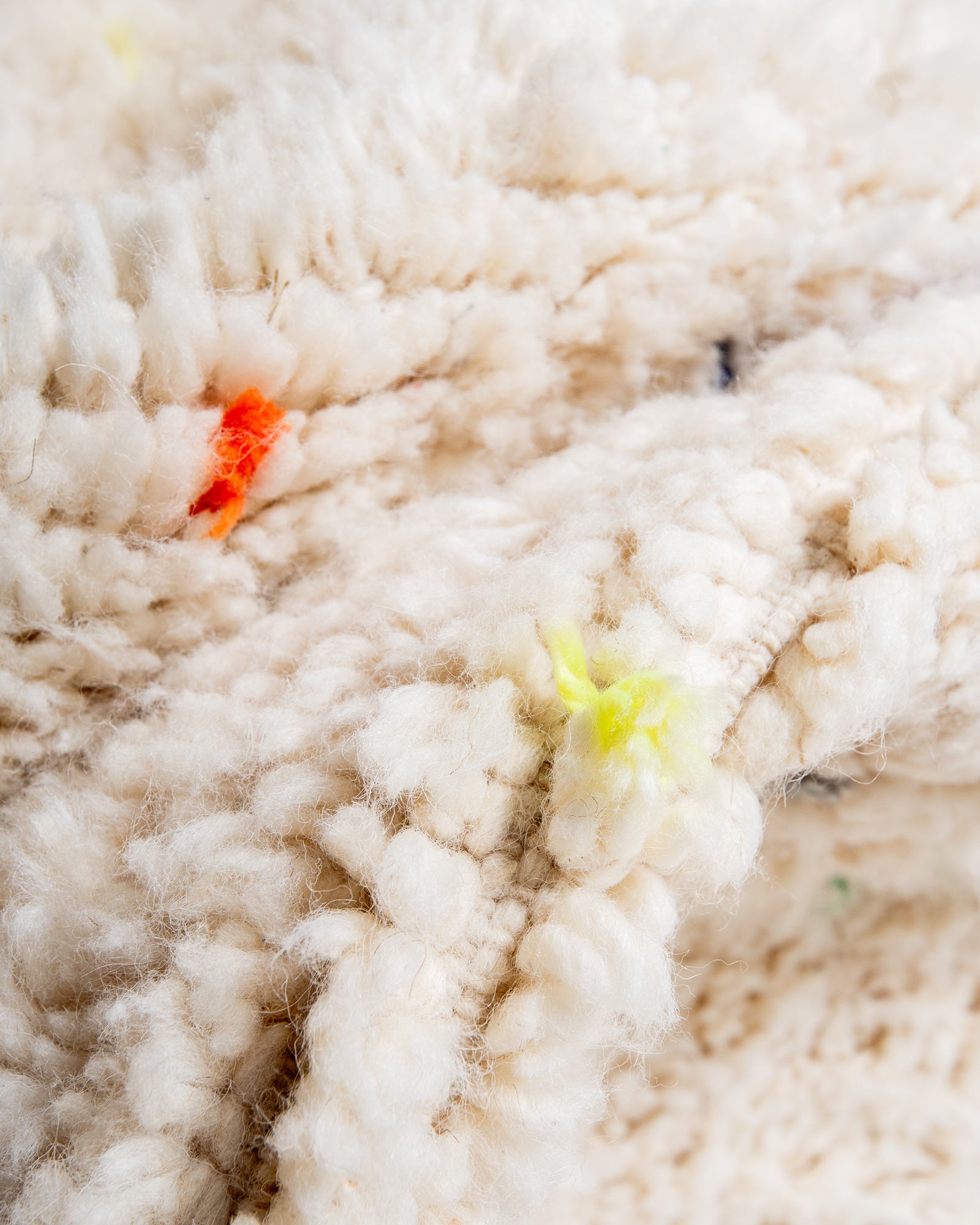 Modern, designer, handcrafted Berber rug from Morocco. Beniourain carpet with minimalist design, natural wool pile and a fluffy texture.