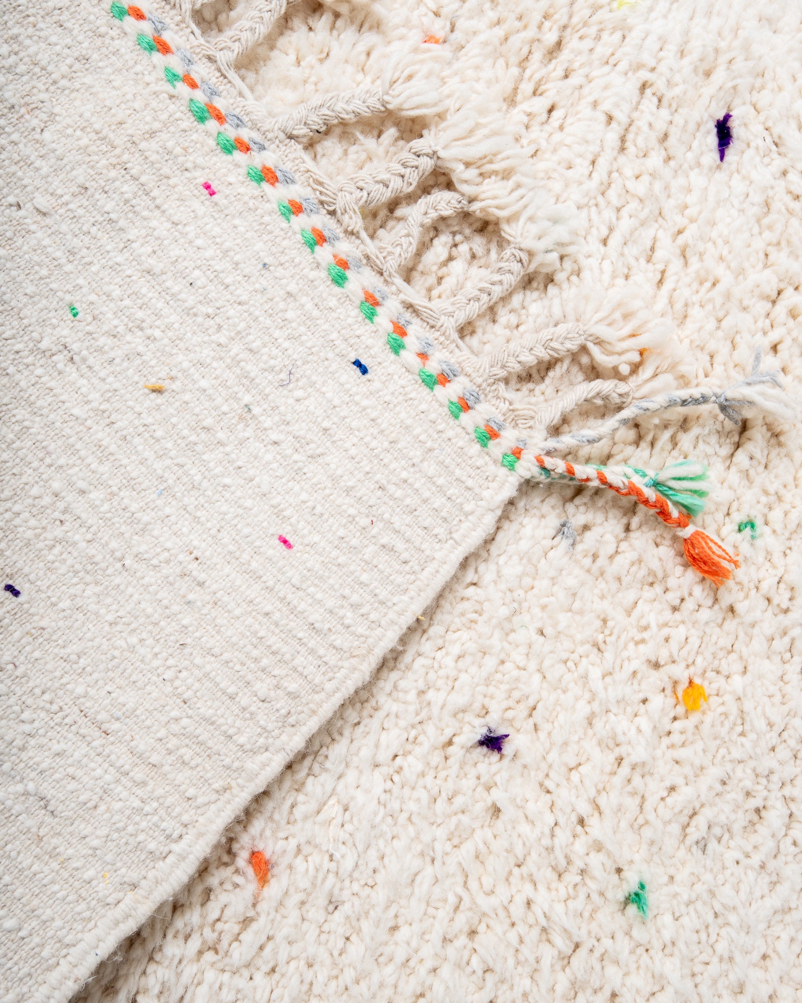 Modern, designer, handcrafted Berber rug from Morocco. Beniourain carpet with minimalist design, natural wool pile and a fluffy texture.