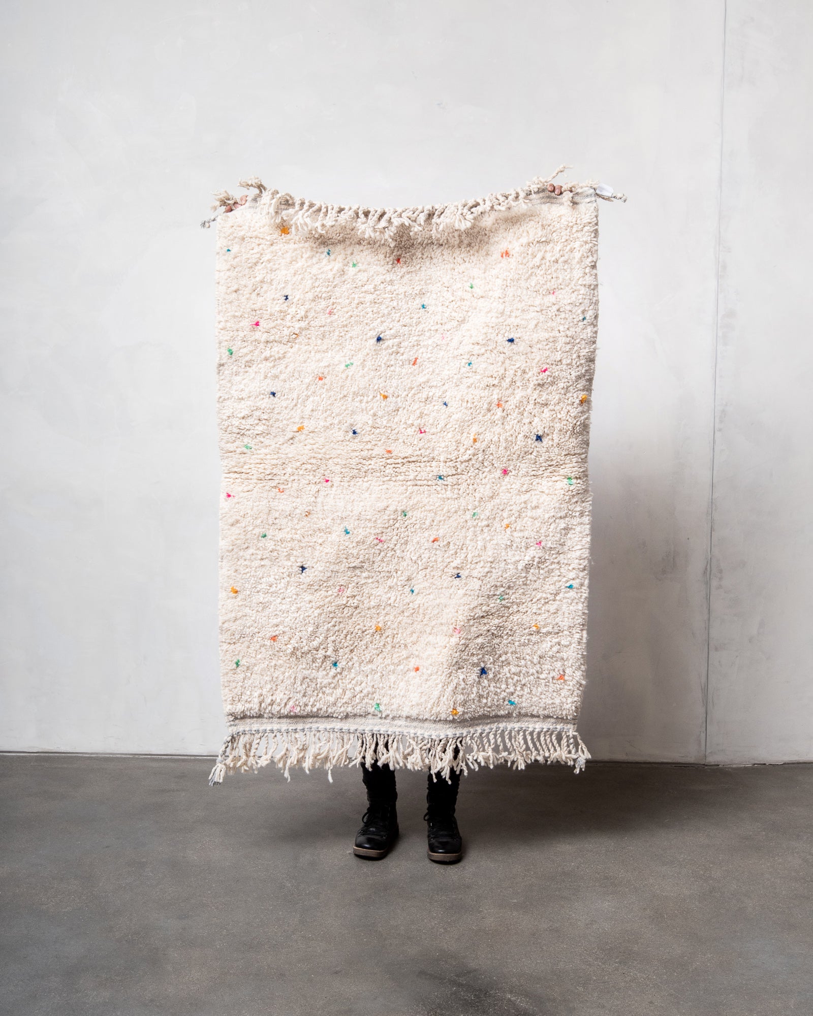 Modern, designer, handcrafted Berber rug from Morocco. Beniourain carpet with minimalist design, natural wool pile and a fluffy texture.