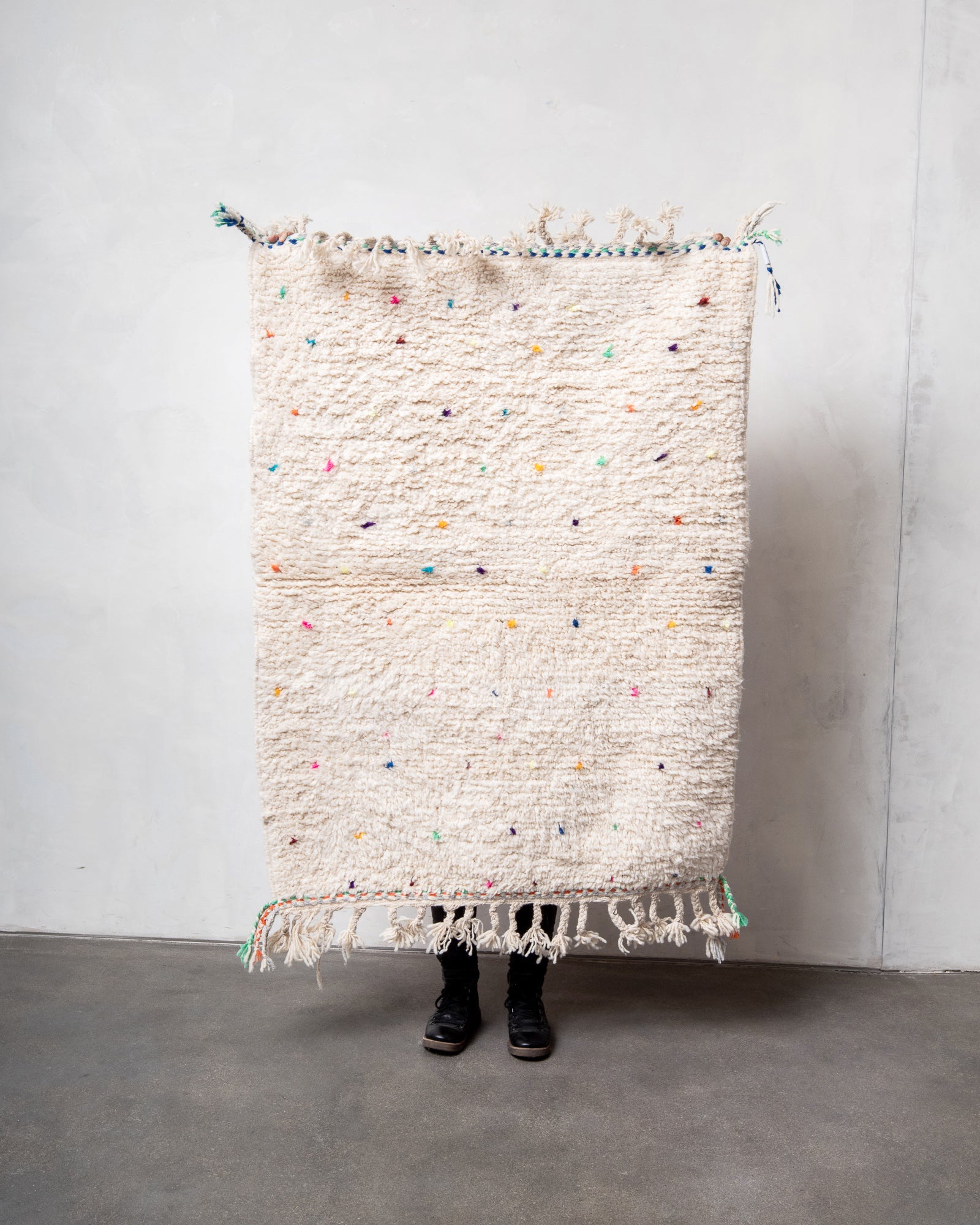 Modern, designer, handcrafted Berber rug from Morocco. Beniourain carpet with minimalist design, natural wool pile and a fluffy texture.