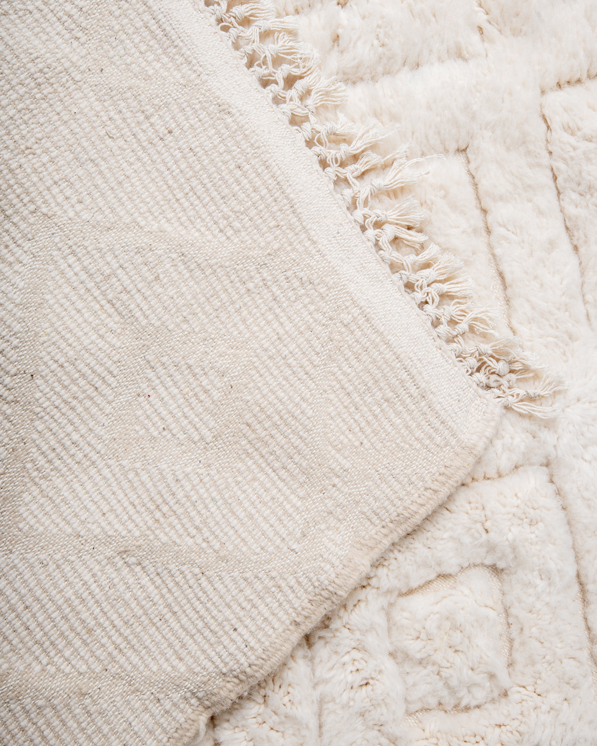 Modern, designer, handcrafted Berber rug from Morocco. Beniourain carpet with beautiful colours and patterns and fluffy wool texture. 