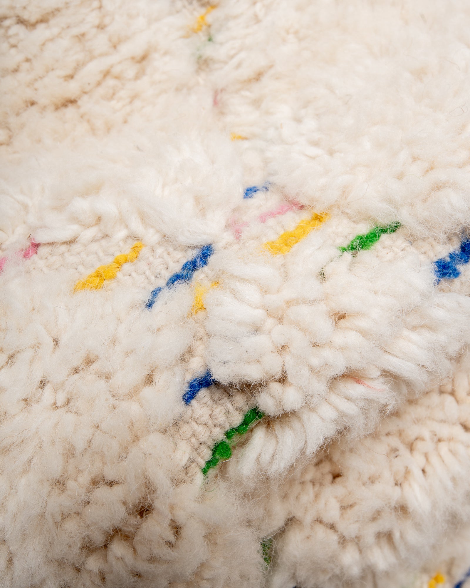 Modern, designer, handcrafted Berber rug from Morocco. Beniourain carpet with minimalist design, natural wool pile and a fluffy texture.