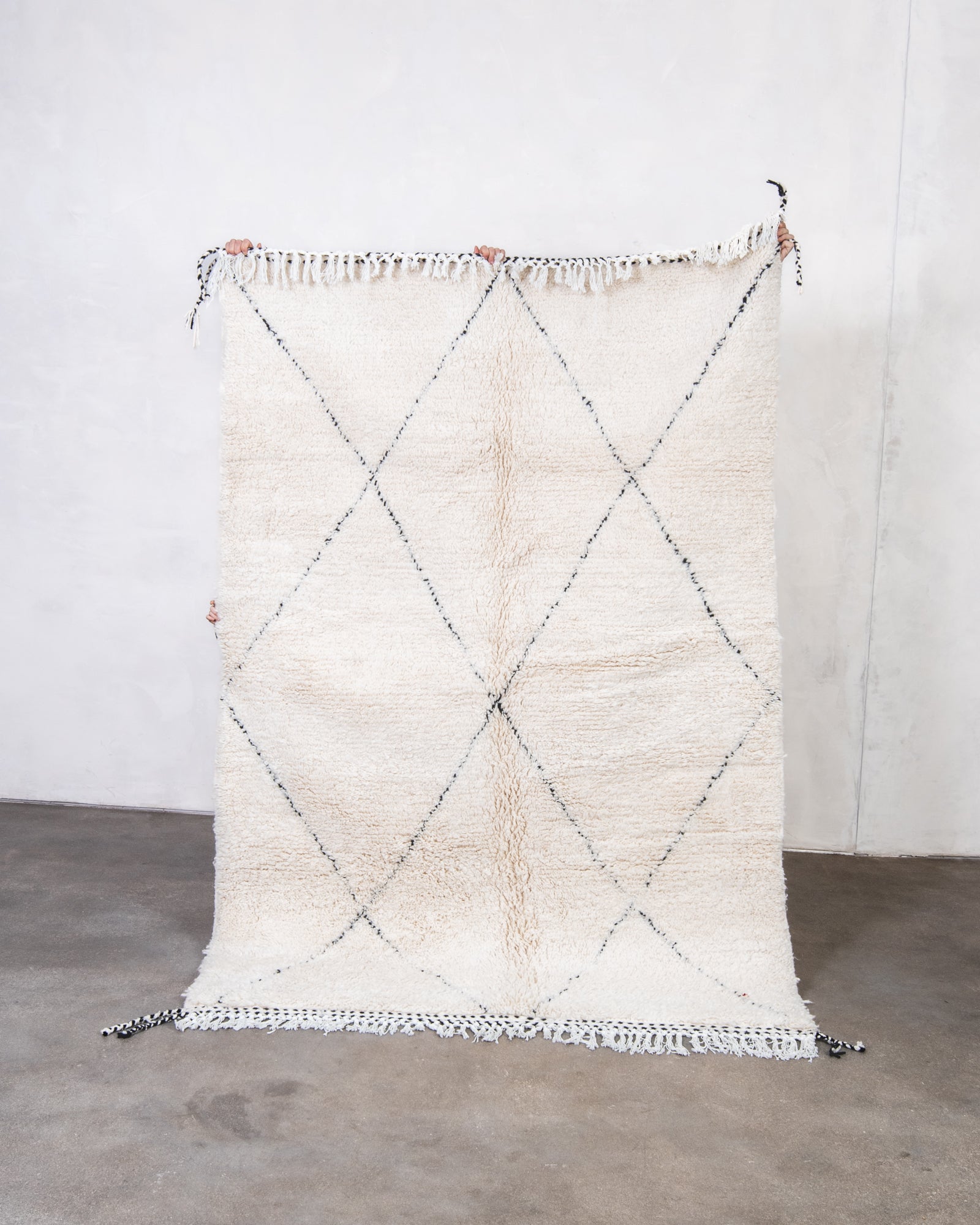 Modern, designer, handcrafted Berber rug from Morocco. Beniourain carpet with beautiful colours and patterns and fluffy wool texture.