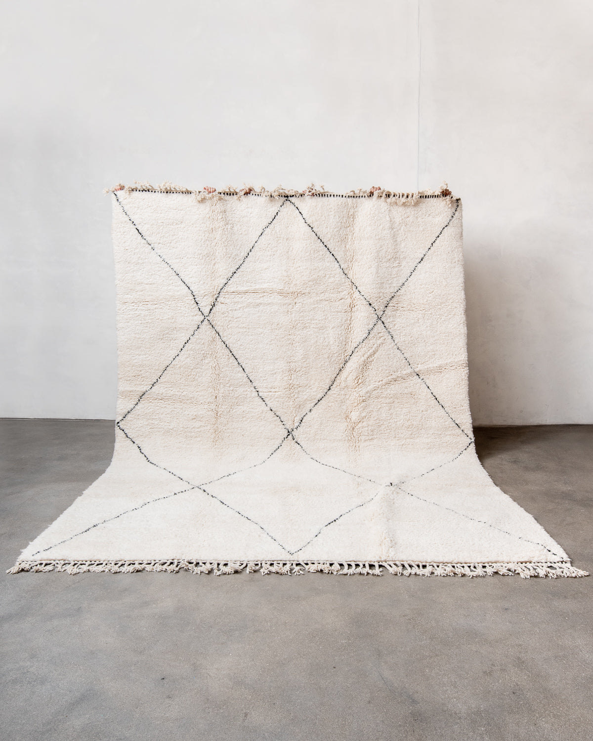 Modern, designer, handcrafted Berber rug from Morocco. Beniourain carpet with beautiful colours and patterns and fluffy wool texture.