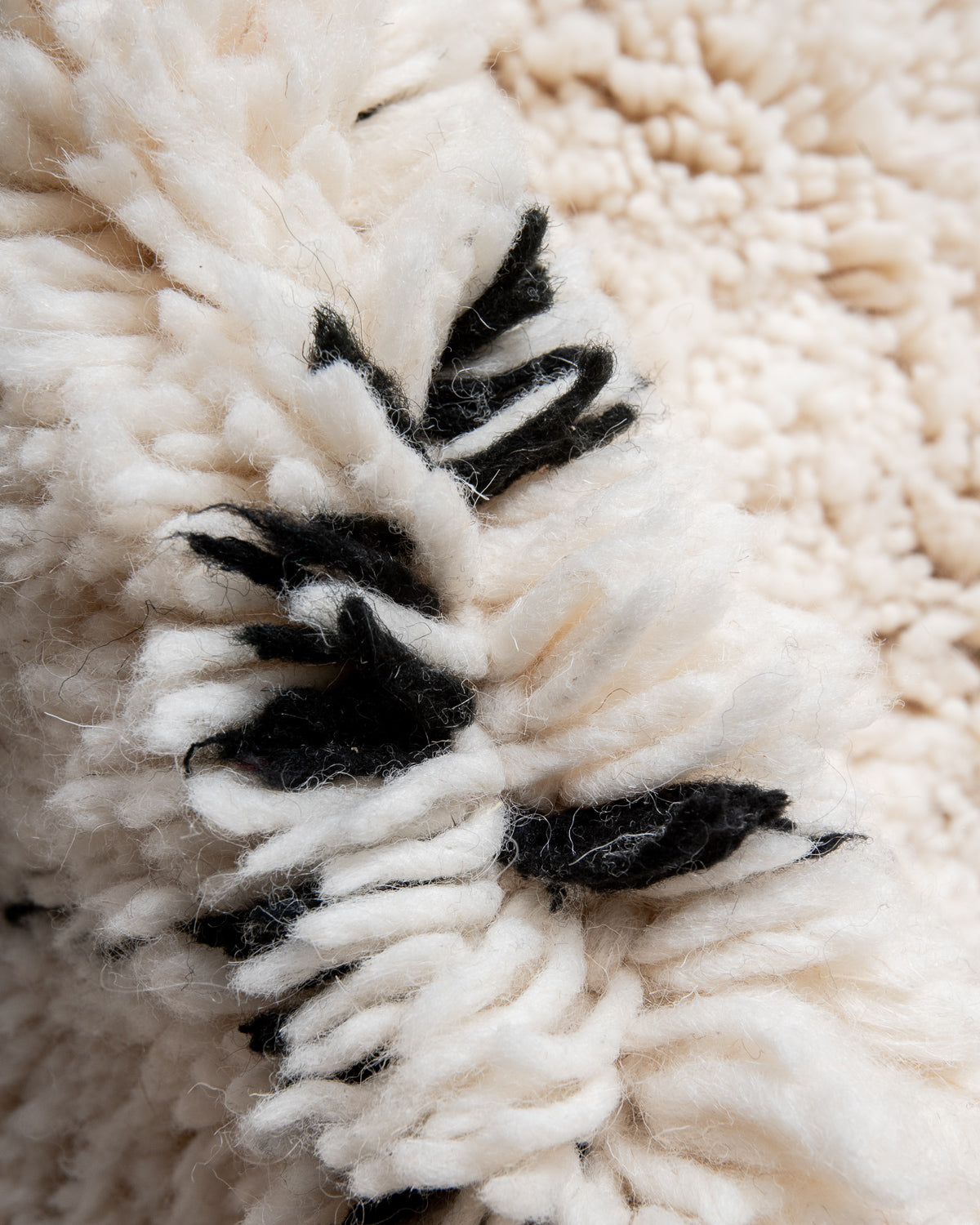 Modern, designer, handcrafted Berber rug from Morocco. Beniourain carpet with beautiful colours and patterns and fluffy wool texture.