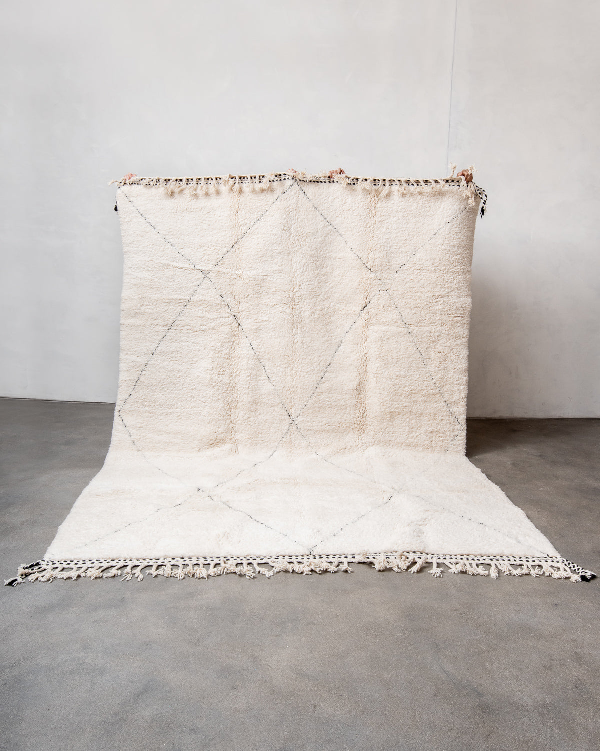 Modern, designer, handcrafted Berber rug from Morocco. Beniourain carpet with beautiful colours and patterns and fluffy wool texture.