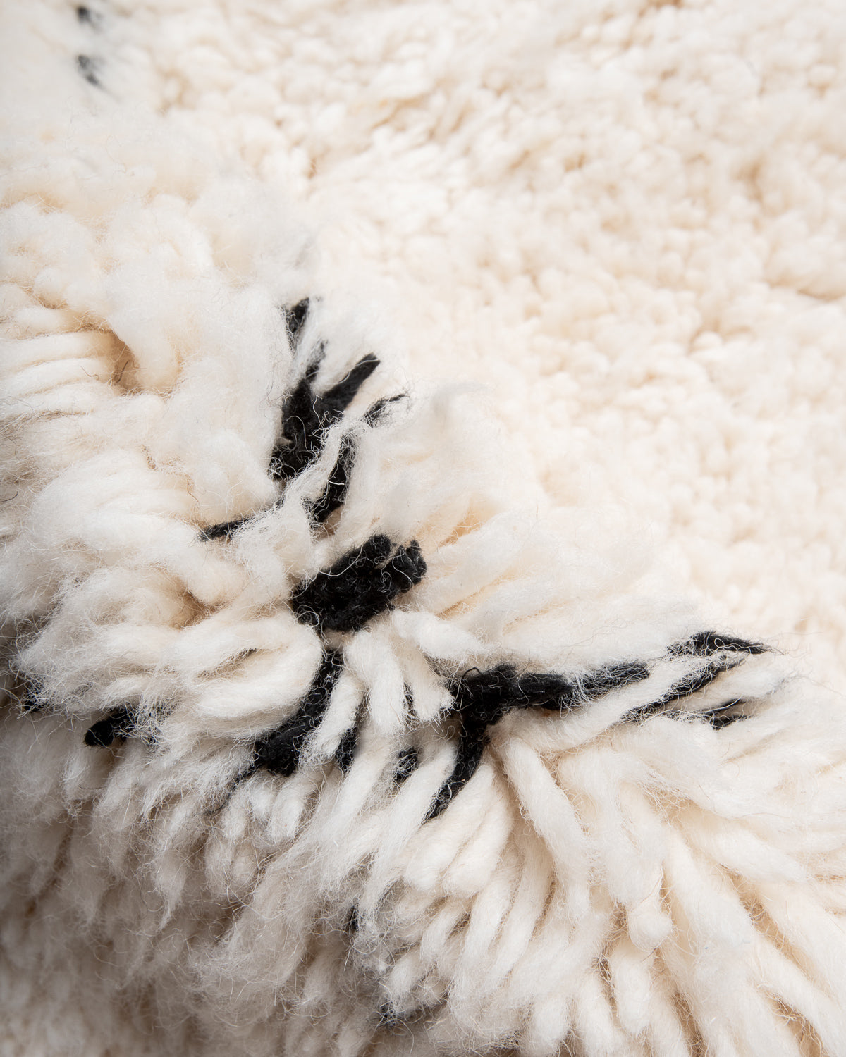 Modern, designer, handcrafted Berber rug from Morocco. Beniourain carpet with beautiful colours and patterns and fluffy wool texture.