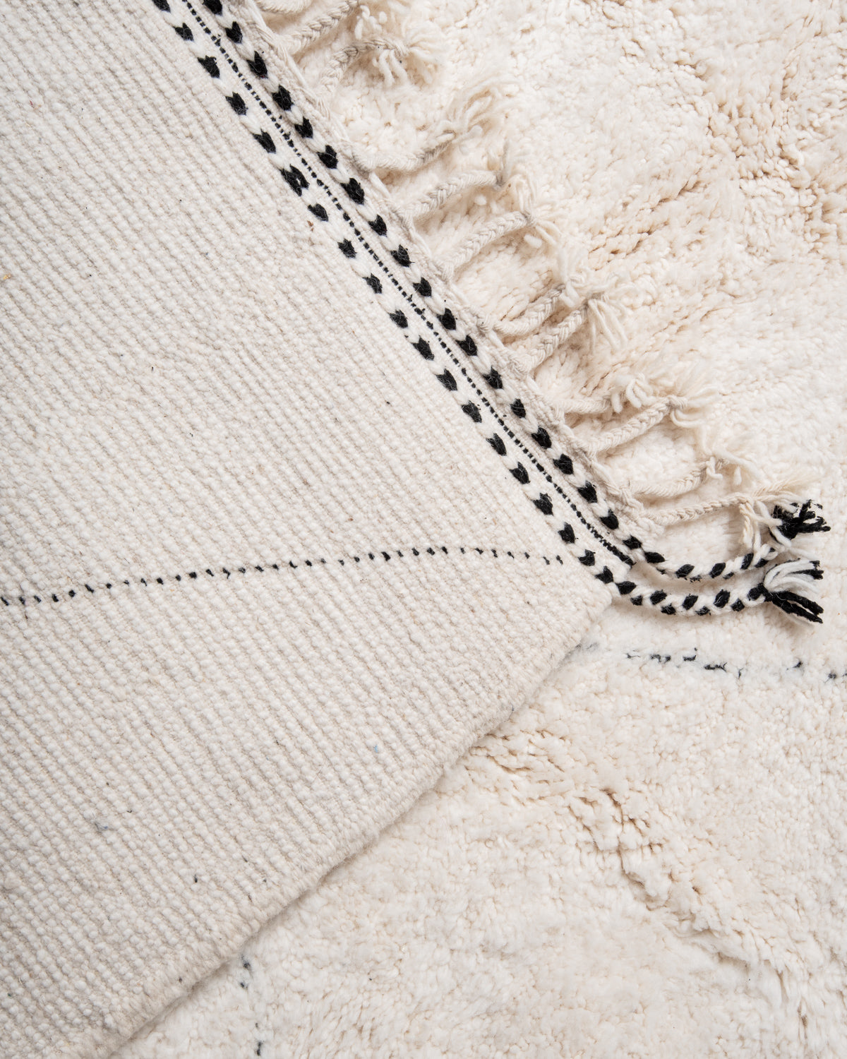 Modern, designer, handcrafted Berber rug from Morocco. Beniourain carpet with beautiful colours and patterns and fluffy wool texture.