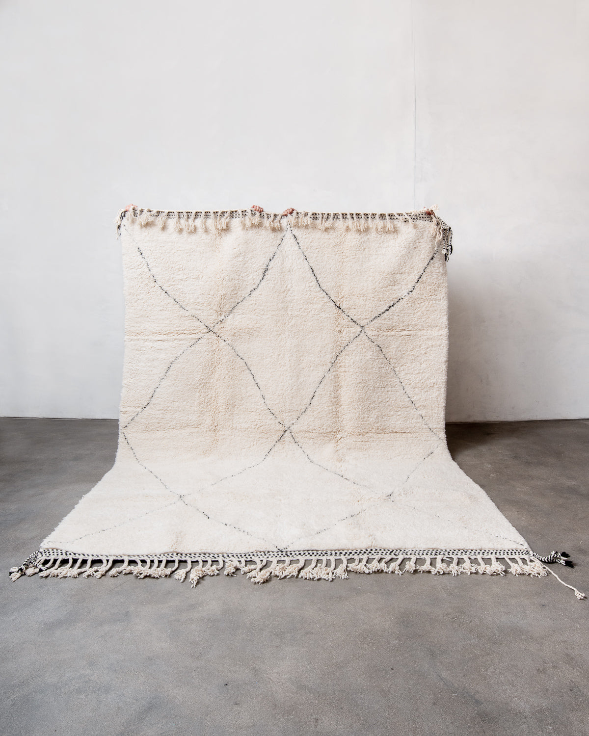 Modern, designer, handcrafted Berber rug from Morocco. Beniourain carpet with beautiful colours and patterns and fluffy wool texture.