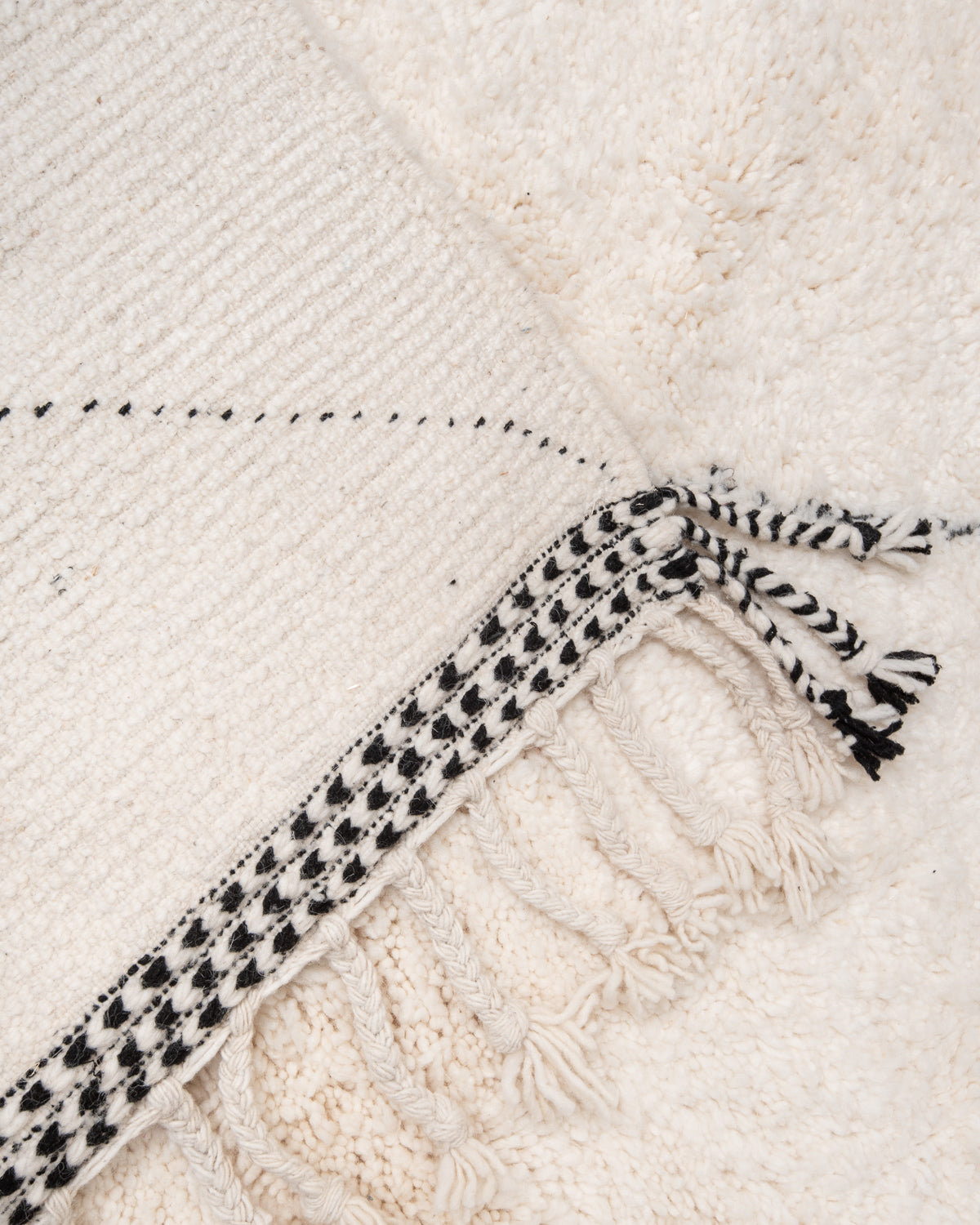 Modern, designer, handcrafted Berber rug from Morocco. Beniourain carpet with beautiful colours and patterns and fluffy wool texture.