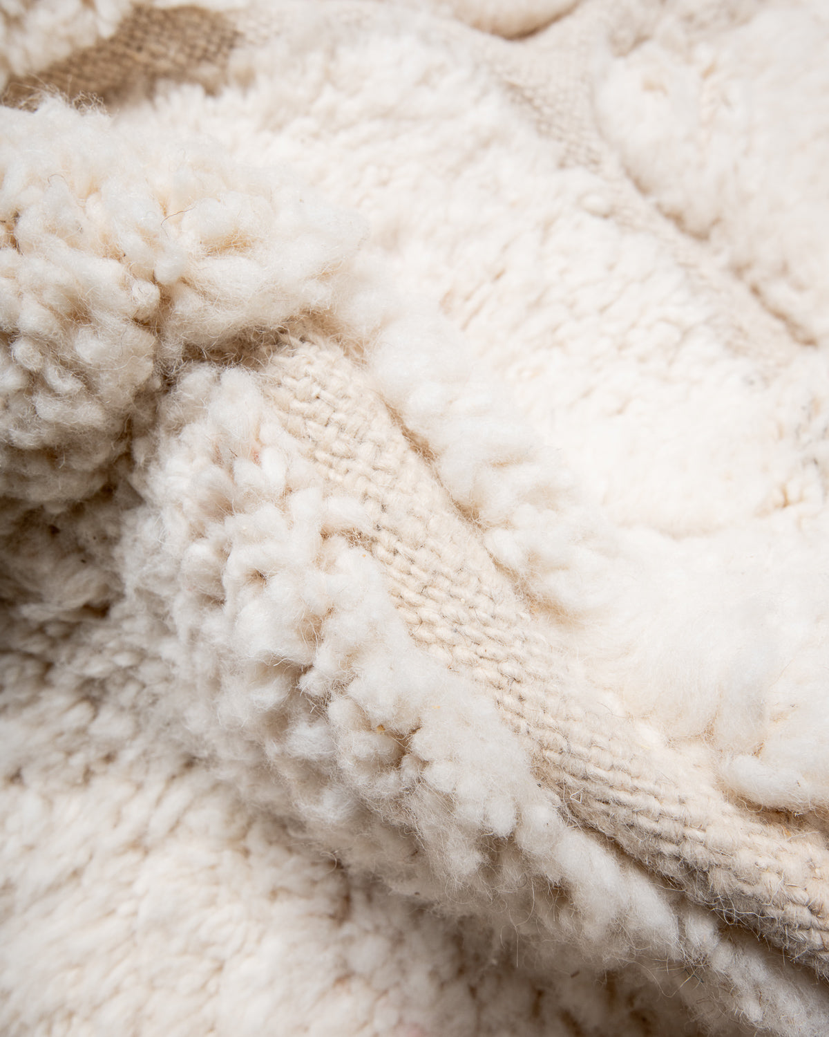 Modern, designer, handcrafted Berber rug from Morocco. Beniourain carpet with beautiful colours and patterns and fluffy wool texture.