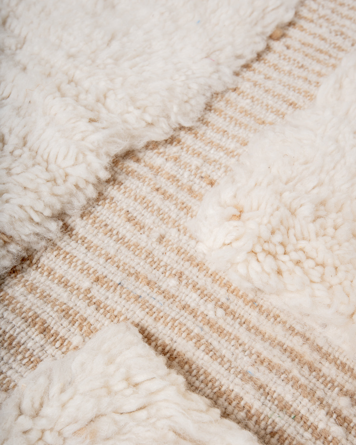 Modern, designer, handcrafted Berber rug from Morocco. Beniourain carpet with beautiful colours and patterns and fluffy wool texture.
