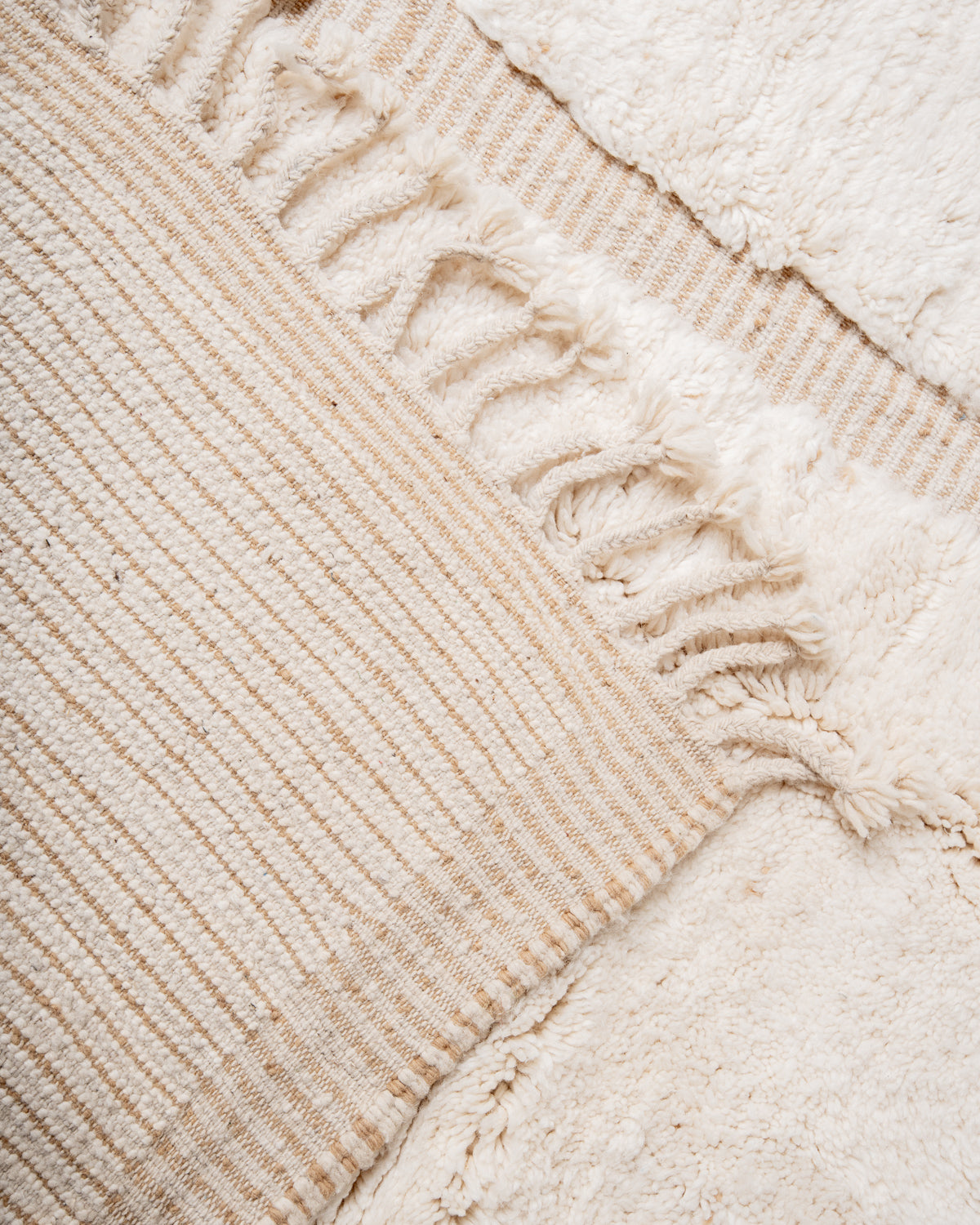 Modern, designer, handcrafted Berber rug from Morocco. Beniourain carpet with beautiful colours and patterns and fluffy wool texture.