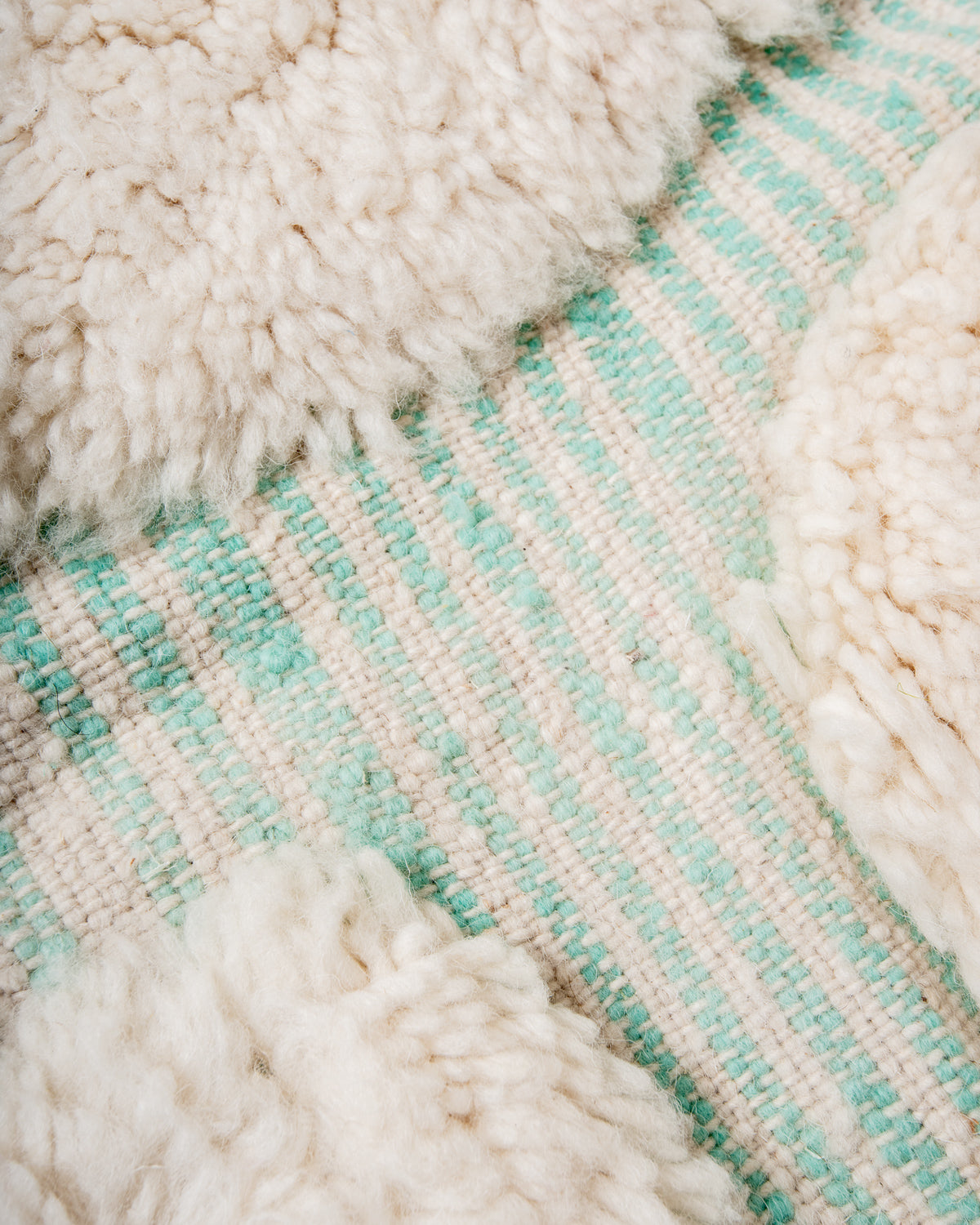 Modern, designer, handcrafted Berber rug from Morocco. Beniourain carpet with beautiful colours and patterns and fluffy wool texture.