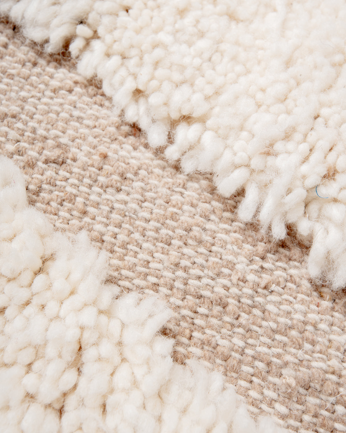 Modern, designer, handcrafted Berber rug from Morocco. Beniourain carpet with beautiful colours and patterns and fluffy wool texture.