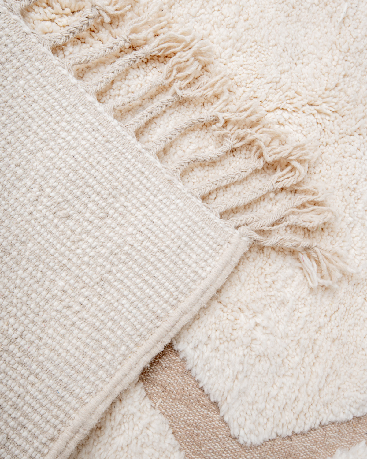 Modern, designer, handcrafted Berber rug from Morocco. Beniourain carpet with beautiful colours and patterns and fluffy wool texture.