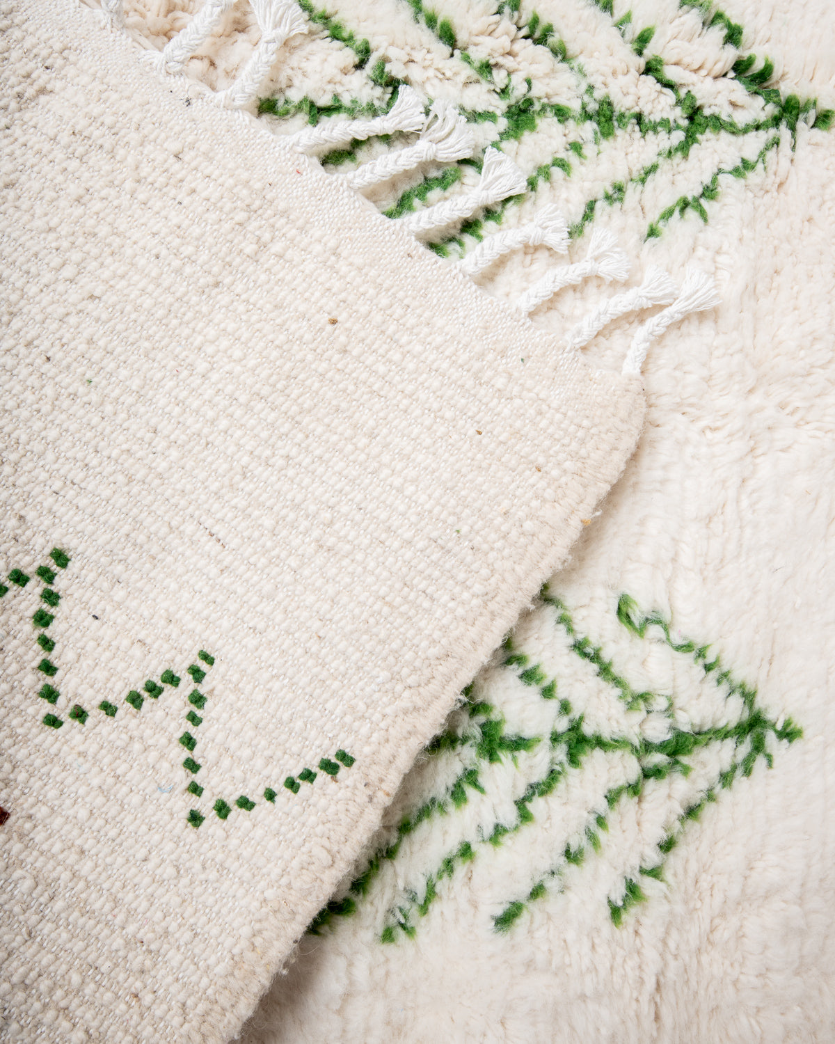 Modern, designer, handcrafted Berber rug from Morocco. Beniourain carpet with beautiful colours and patterns and fluffy wool texture.