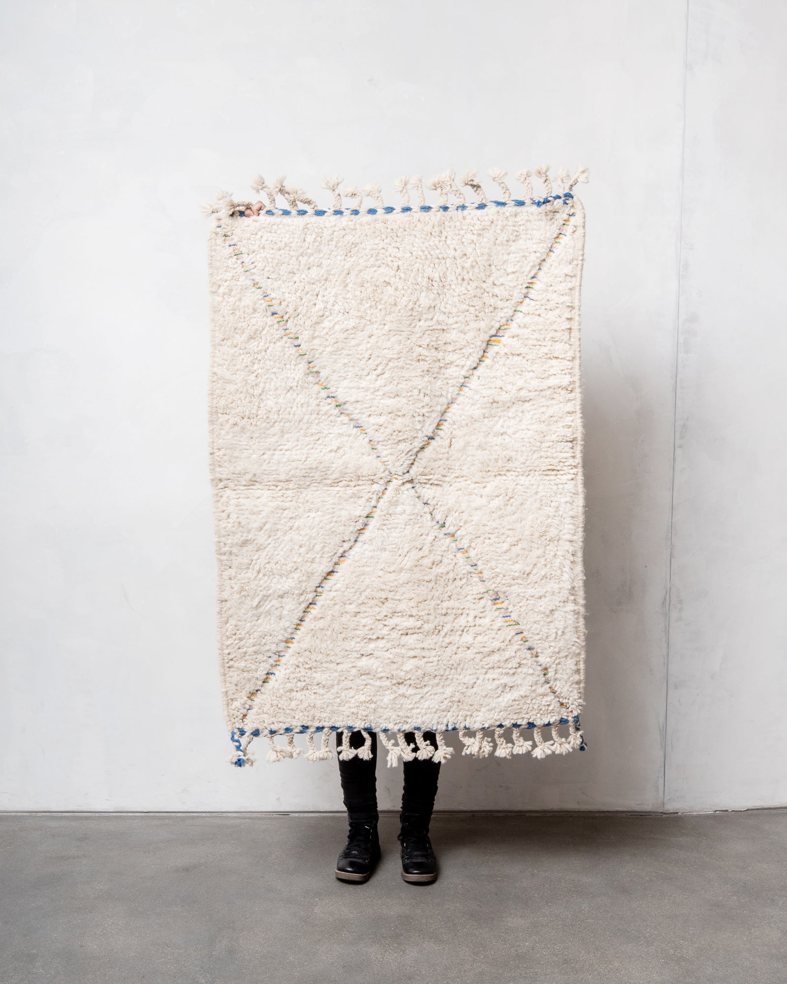 Modern, designer, handcrafted Berber rug from Morocco. Beniourain carpet with beautiful colours and patterns and fluffy wool texture.