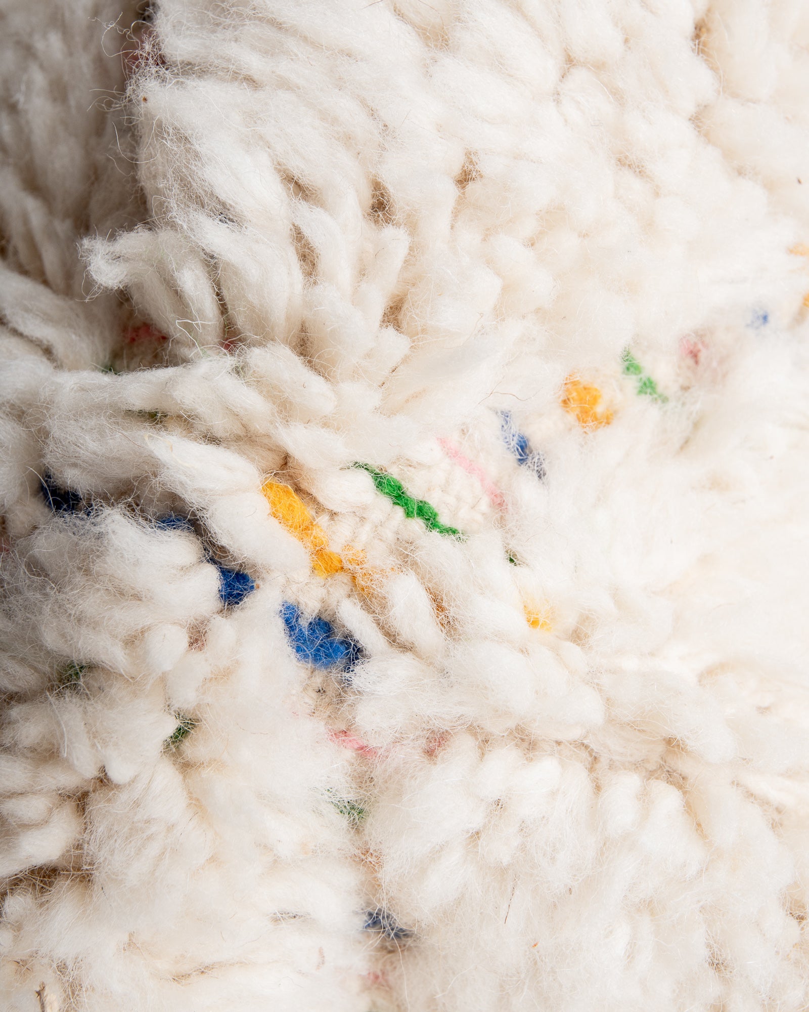 Modern, designer, handcrafted Berber rug from Morocco. Beniourain carpet with beautiful colours and patterns and fluffy wool texture.