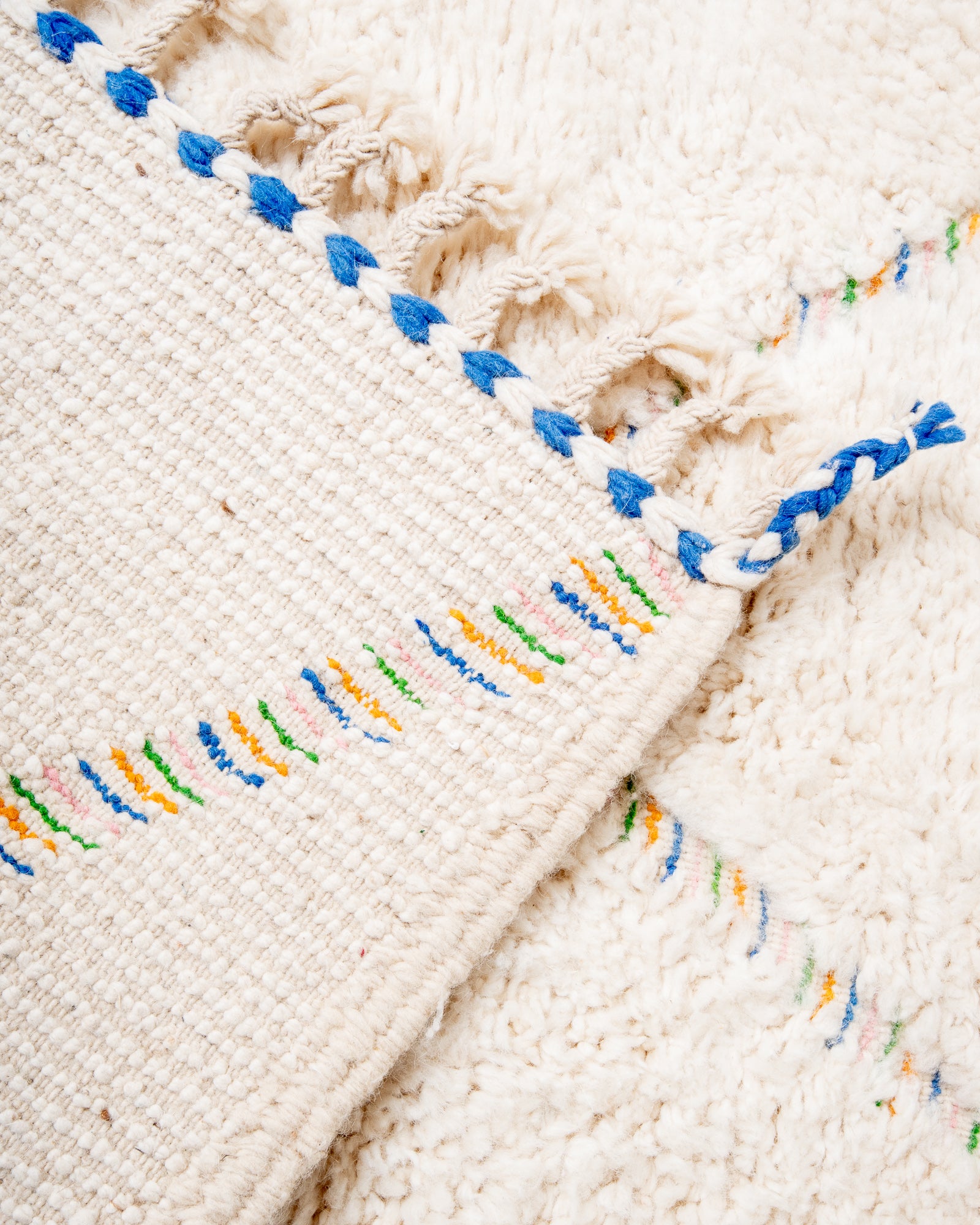 Modern, designer, handcrafted Berber rug from Morocco. Beniourain carpet with beautiful colours and patterns and fluffy wool texture.