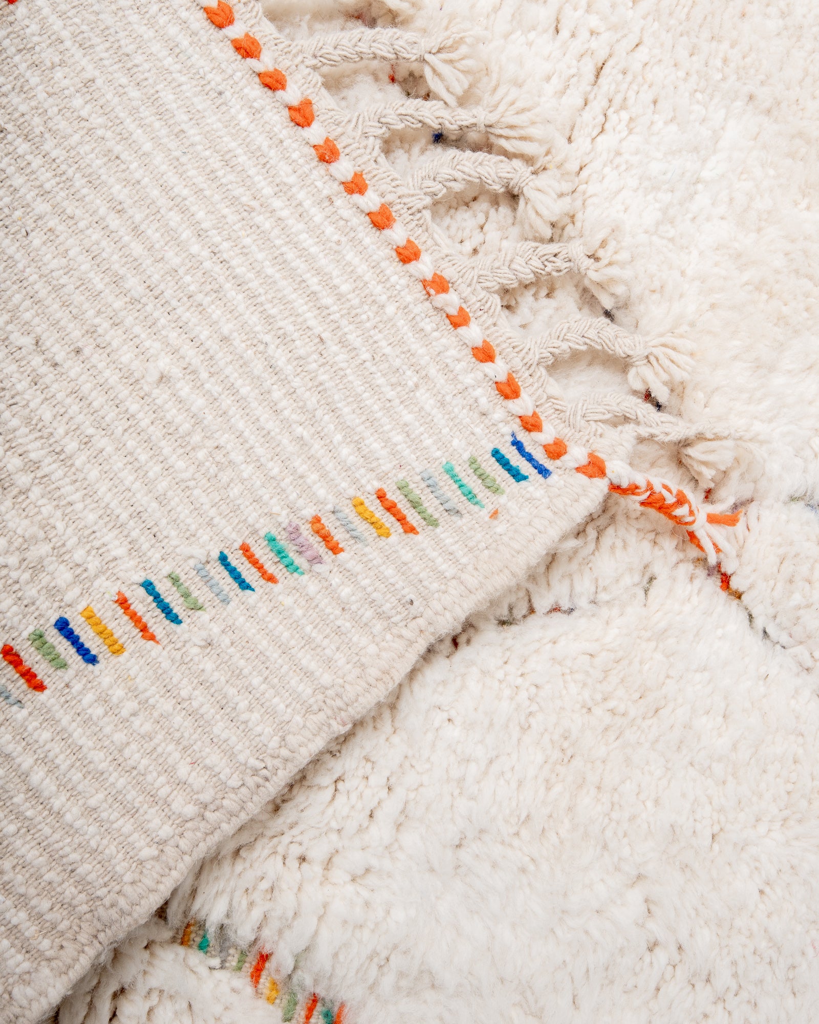 Modern, designer, handcrafted Berber rug from Morocco. Beniourain carpet with beautiful colours and patterns and fluffy wool texture.