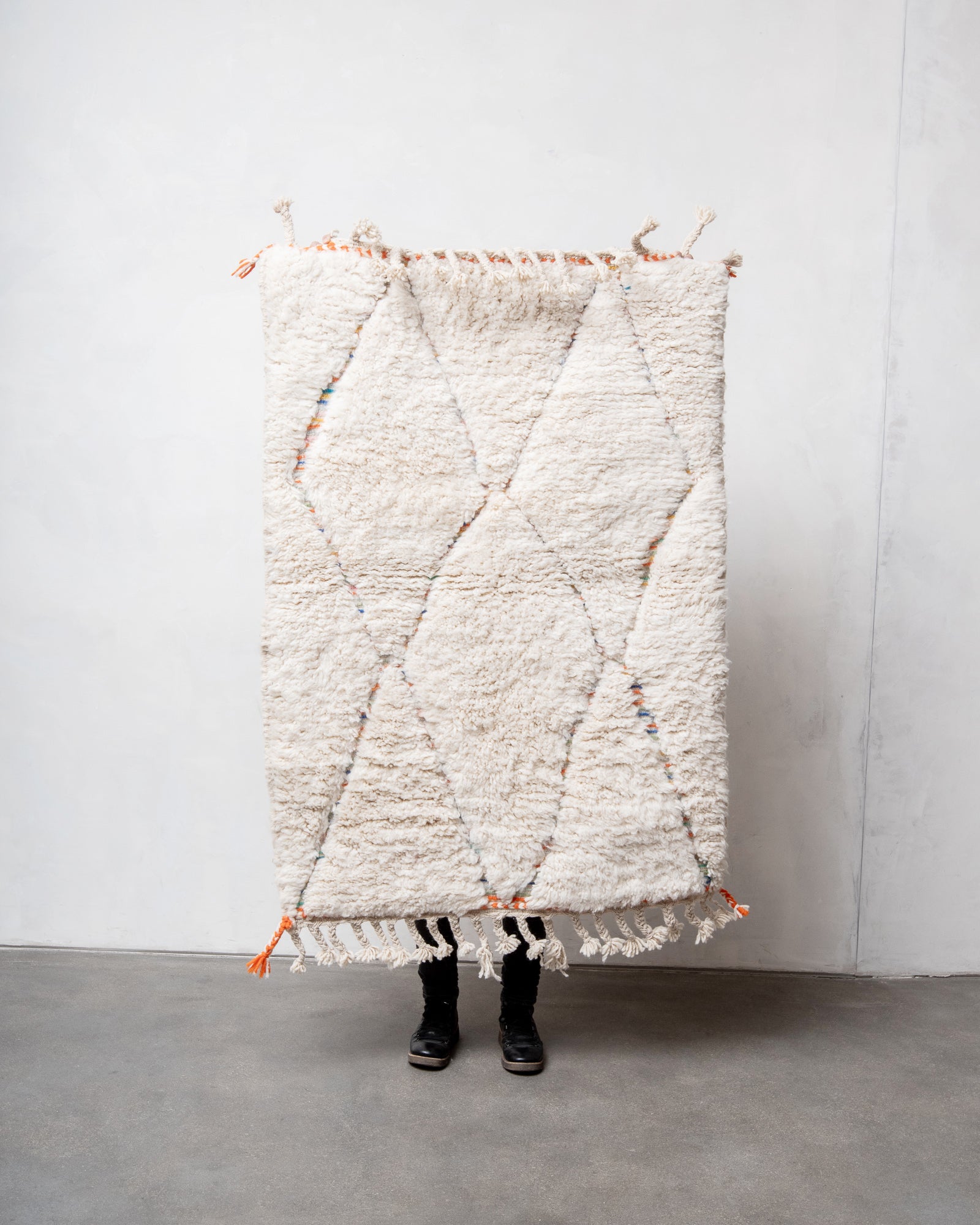 Modern, designer, handcrafted Berber rug from Morocco. Beniourain carpet with beautiful colours and patterns and fluffy wool texture.