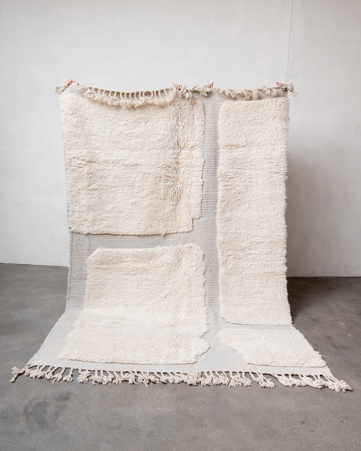 Modern, designer, handcrafted Berber rug from Morocco. Beniourain carpet with beautiful colours and patterns and fluffy wool texture.