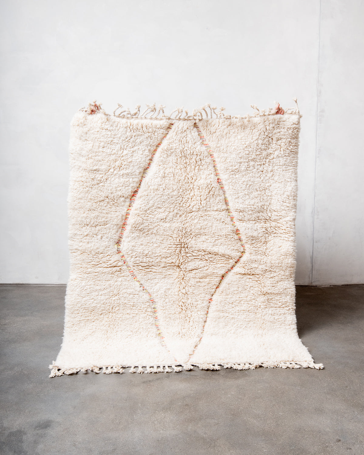 Modern, designer, handcrafted Berber rug from Morocco. Beniourain carpet with beautiful colours and patterns and fluffy wool texture.