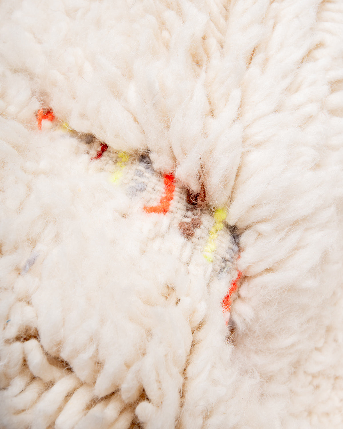 Modern, designer, handcrafted Berber rug from Morocco. Beniourain carpet with beautiful colours and patterns and fluffy wool texture.