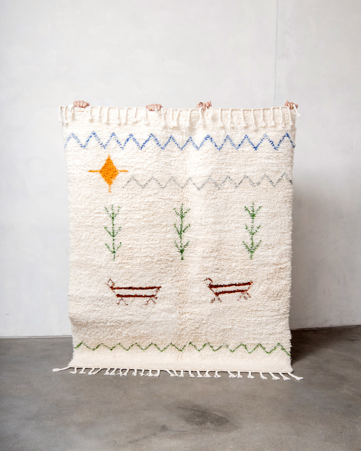 Modern, designer, handcrafted Berber rug from Morocco. Beniourain carpet with beautiful colours and patterns and fluffy wool texture.