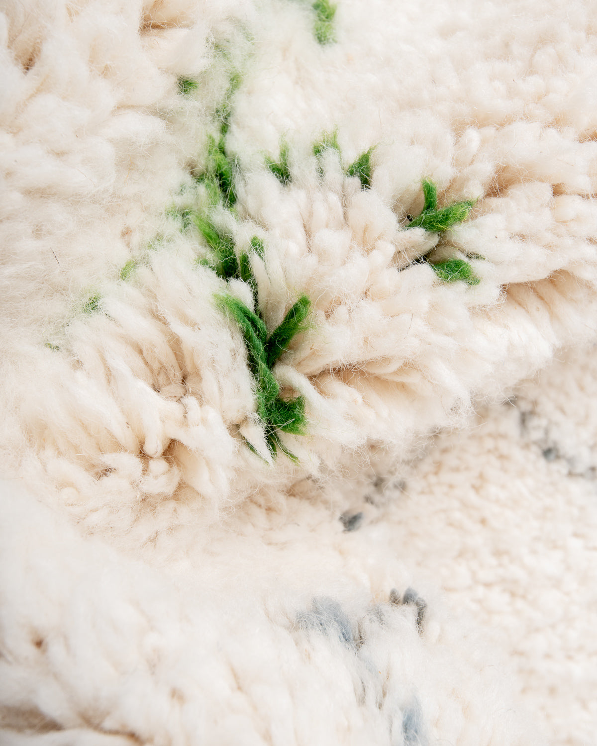 Modern, designer, handcrafted Berber rug from Morocco. Beniourain carpet with beautiful colours and patterns and fluffy wool texture.