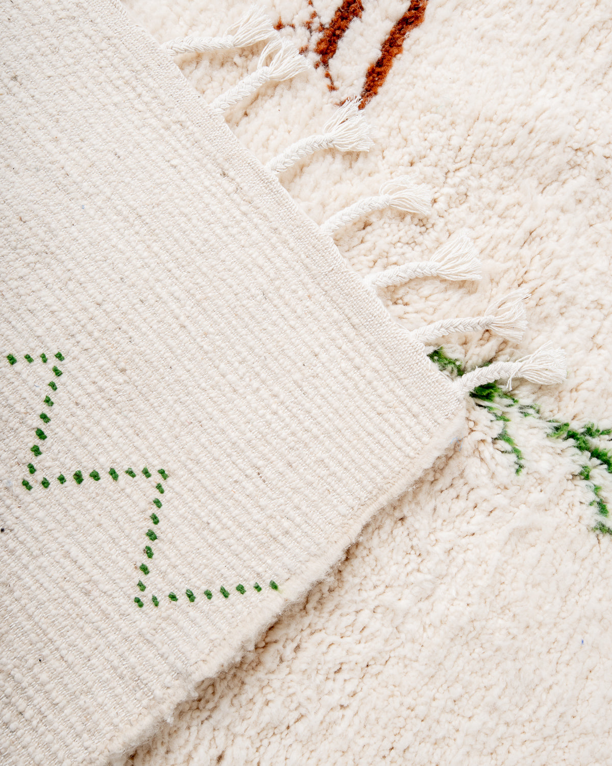 Modern, designer, handcrafted Berber rug from Morocco. Beniourain carpet with beautiful colours and patterns and fluffy wool texture.