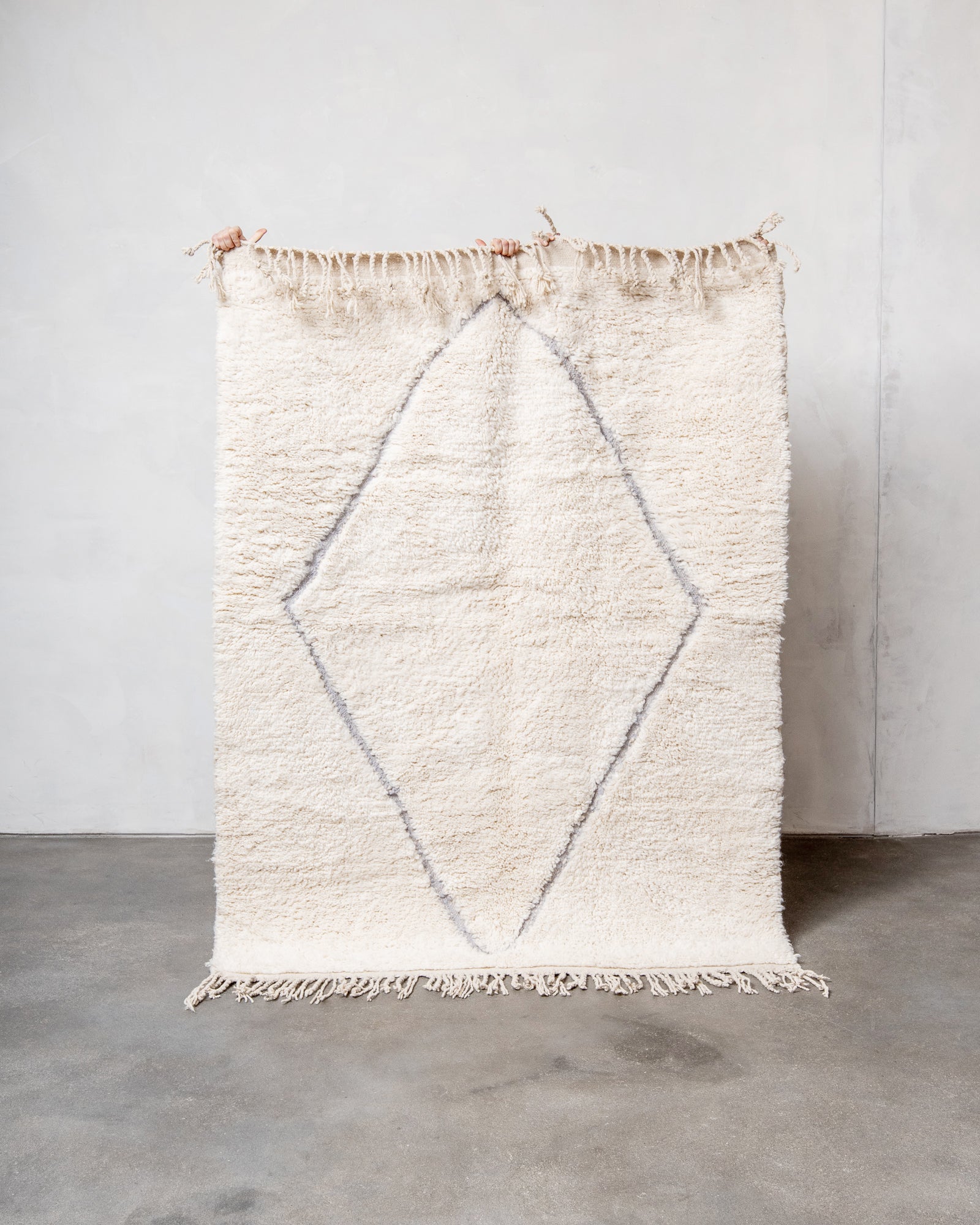 Modern, designer, handcrafted Berber rug from Morocco. Beniourain carpet with beautiful colours and patterns and fluffy wool texture.